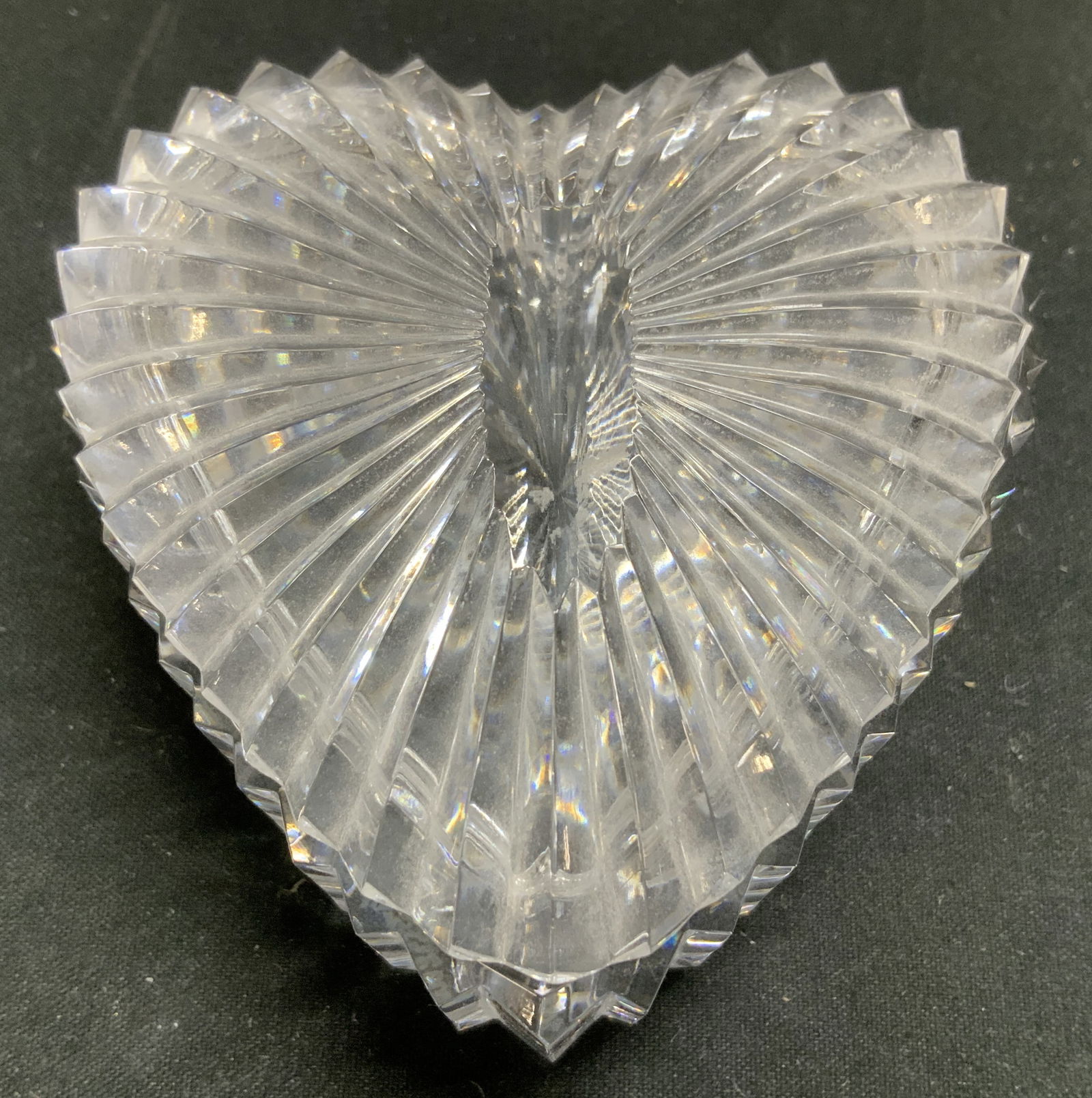 Waterford Crystal Heart Trinket Dish: Waterford Crystal trinket dish shaped like a heart with a ribbed style design. Signed & marked on underside. Reads, WATERFORD. Surface wear consistent to age, use & exposure. Measurements: length