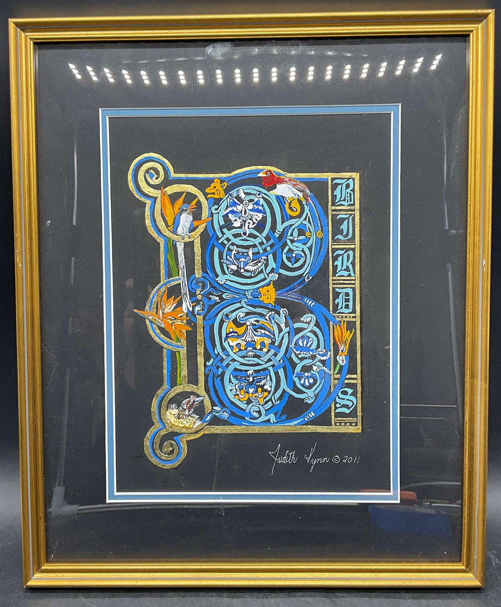 Judith Lynn Gothic Letter B Birds Gilt Watercolor: Framed watercolor, ink and 18k gold leaf painting on paper. Signed Judith Lynn. Gothic letter b with bird motif. Gold tone frame. Not examined out of frame. Frame measures approx 15.5 x 12.75