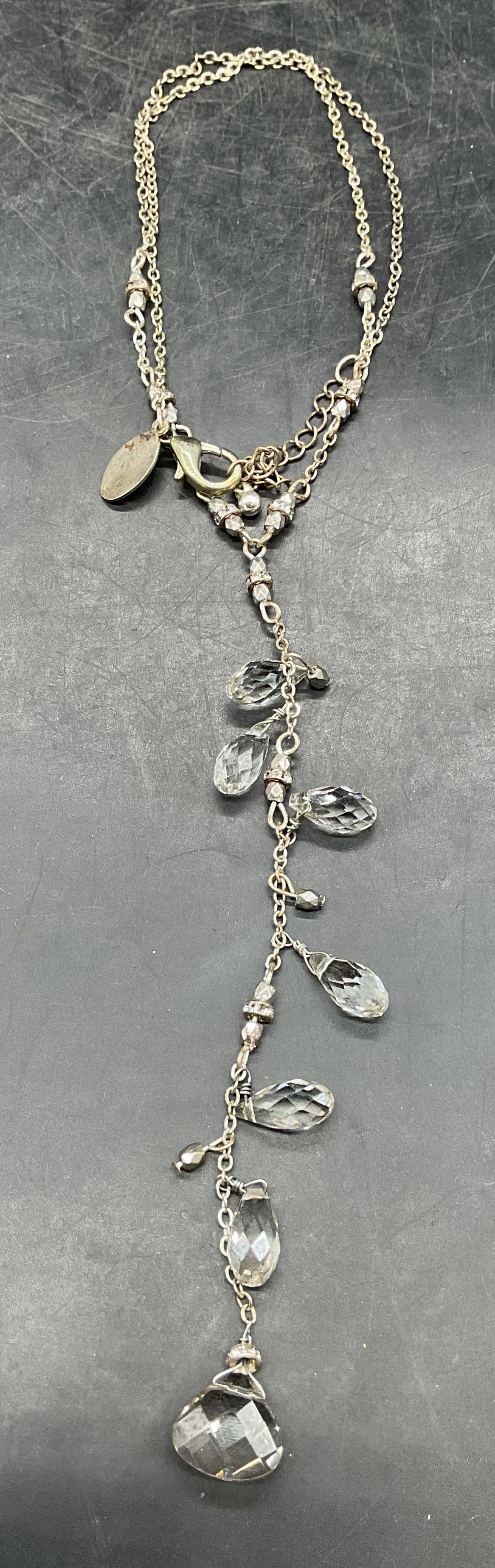 WHBM Silver Tone Crystal Necklace: Signed White House Black Market silver tone crystal pendant necklace. Drop length approx 9 inches. Some scratching. Jewelry, estate jewelry, costume jewelry, cocktail jewelry, fashion jewelry,