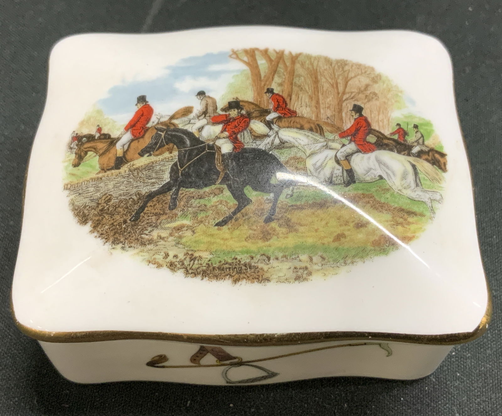 Hammersley Bone China Trinket Box ENGLAND: Hammersley bone china trinket box features a hunting scene on lid. Gilt accents. Signed & marked on underside. Reads, BONE CHINA HAMMERSLEY. MADE IN ENGLAND. Surface wear consistent to age, use & expo