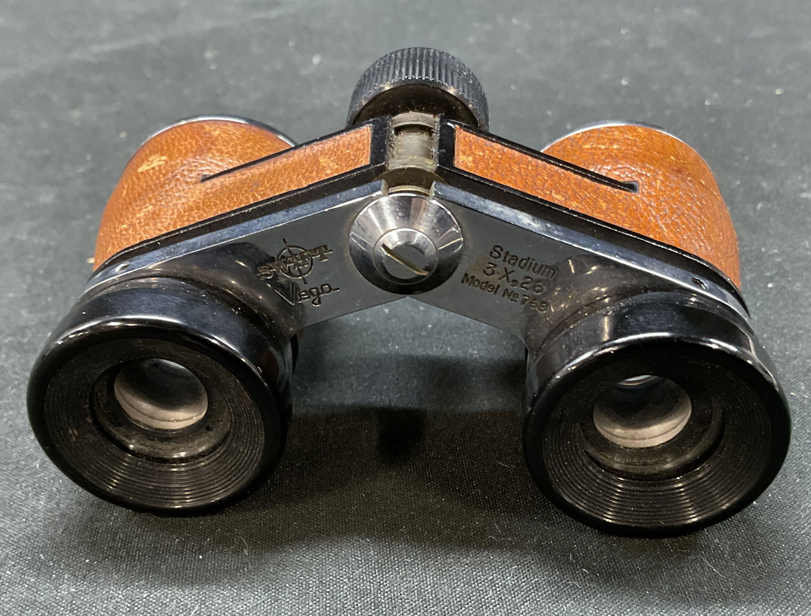 Swift Vega Stadium 3X26 Opera Glasses Japan: Swift Vega Stadium 3X26 opera glasses. Made in Japan. Brown leather and metal. Measures approx 4 x 2 x 1 inches. Not tested for function. Surface wear consistent with exposure. Opera glasses, opera ac
