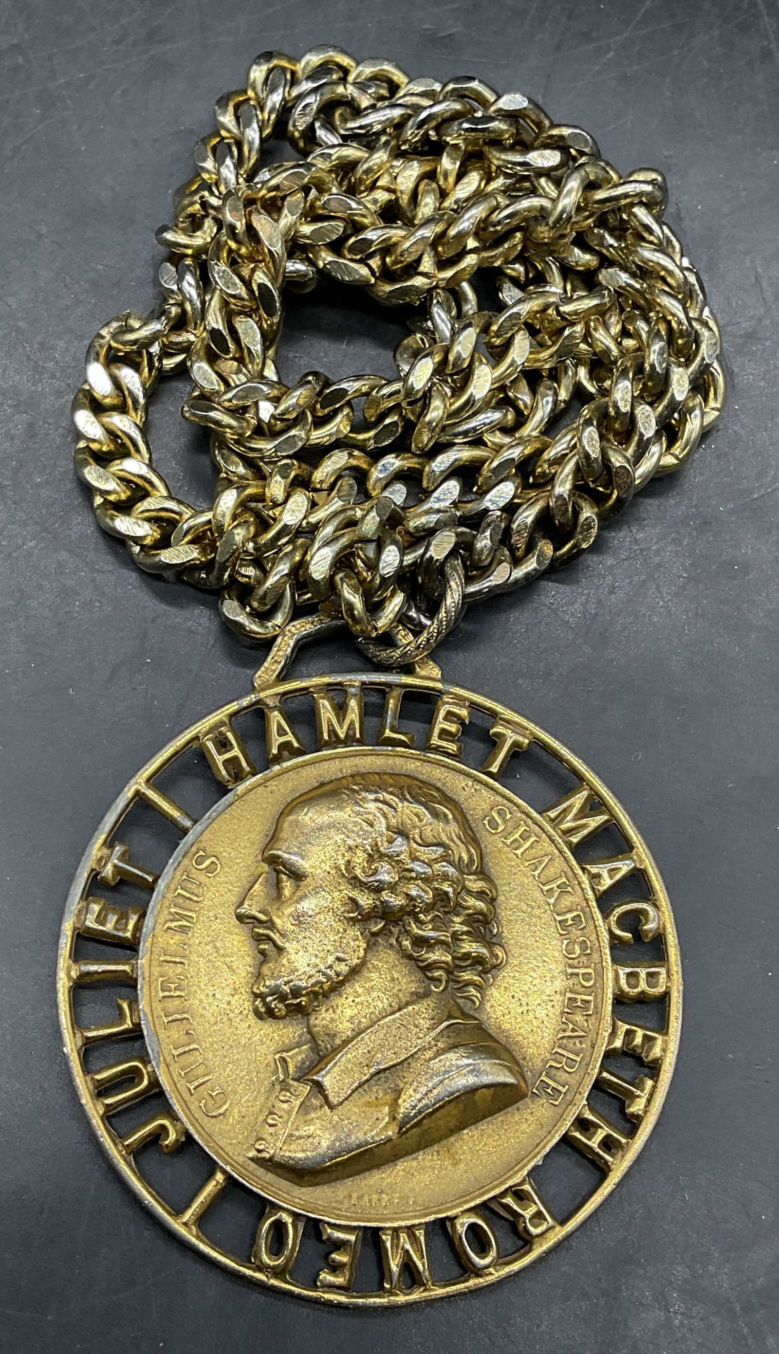 Vintage Gold Tone Shakespeare Pendant Necklace: Vintage gold tone necklace Shakespeare medallion pendant. Drop length approx 12 inches. Some scratching. Jewelry, estate jewelry, costume jewelry, cocktail jewelry, fashion jewelry, accessories, fashi