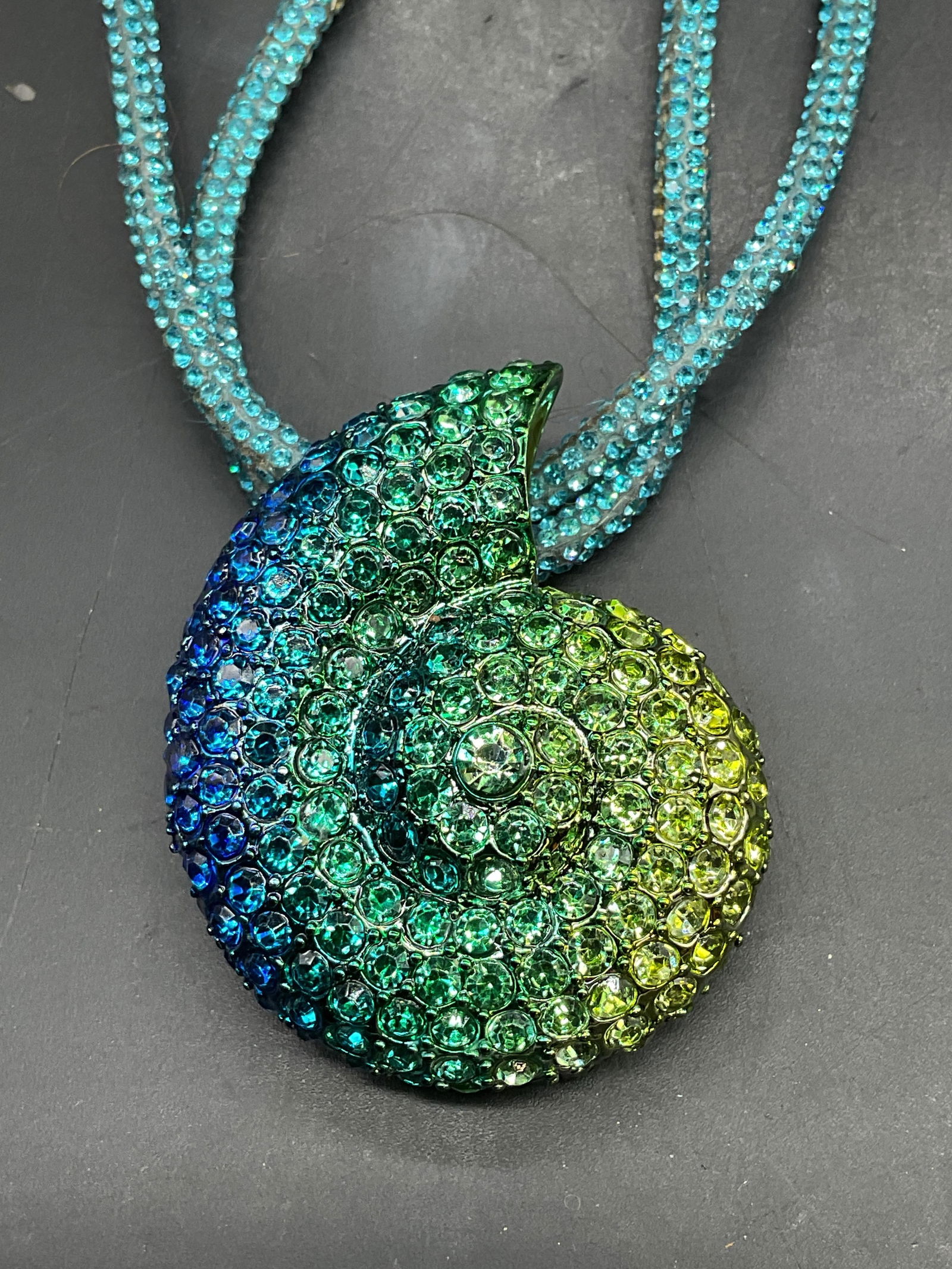 Betsy Johnson Crystal Shell Pendant Necklace: Betsy Johnson Mermaid Jewels blue ombre shell crystal necklace. Signed. Drop length approx 9 inches. Some scratching. Splitting to cord. Jewelry, estate jewelry, costume jewelry, cocktail jewelry, fas