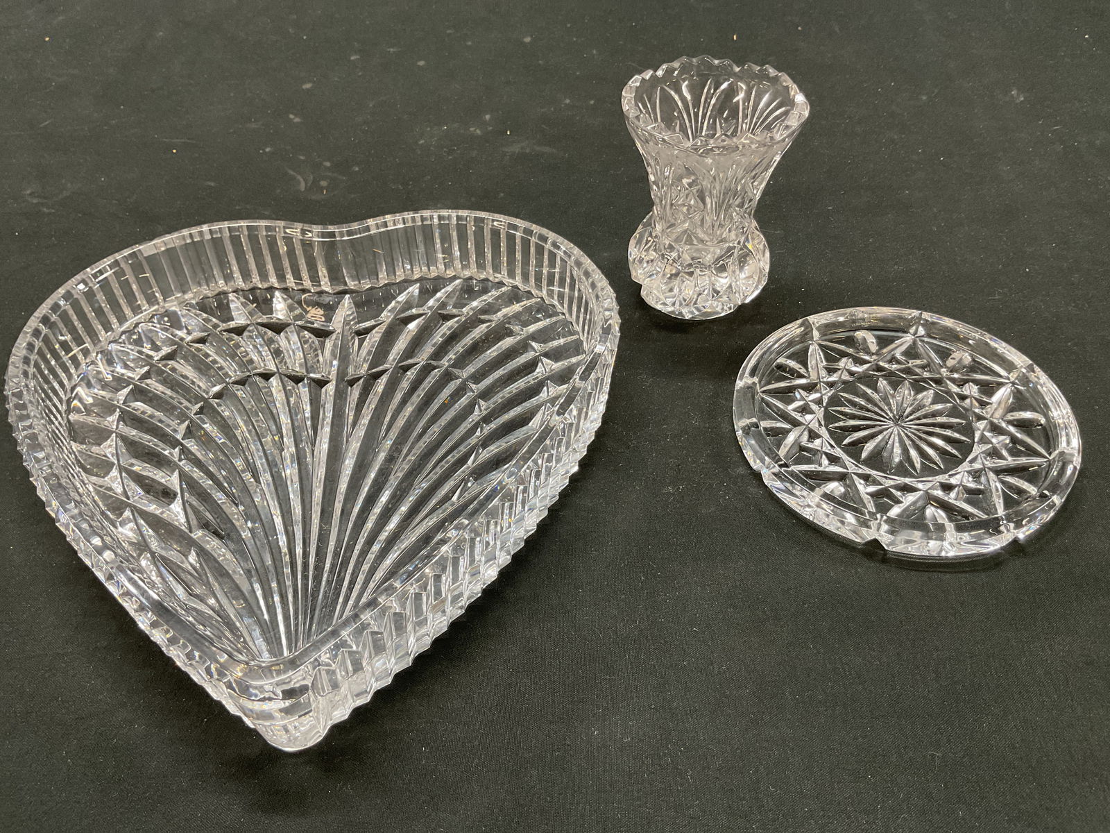 Lot 3 Waterford+ Crystal & Glass Tableware: Lot of 3 items. Waterford crystal heart shaped trinket dish. Signed Waterford on underside. Ribbed design. Vintage crystal toothpick holder. Sawtooth rim. Cut geometric and fan patterns. Flared