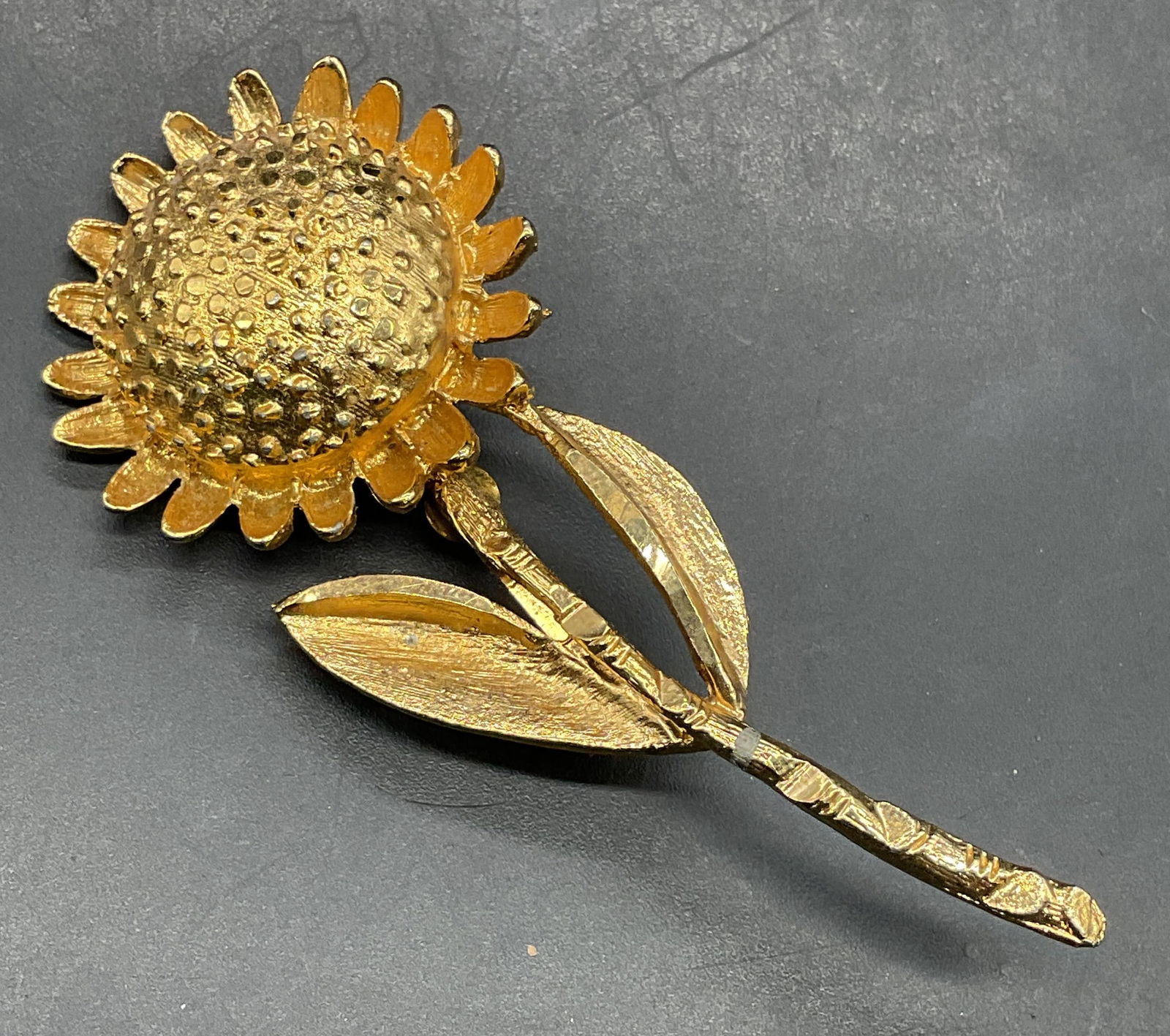 Vintage BSK Gold Tone Flower Brooch: Vintage signed BSK gold tone flower brooch. Measures approx. 2.75 x 1.25 inches. Some scratching. Jewelry, estate jewelry, costume jewelry, cocktail jewelry, fashion jewelry, accessories, fashion acce