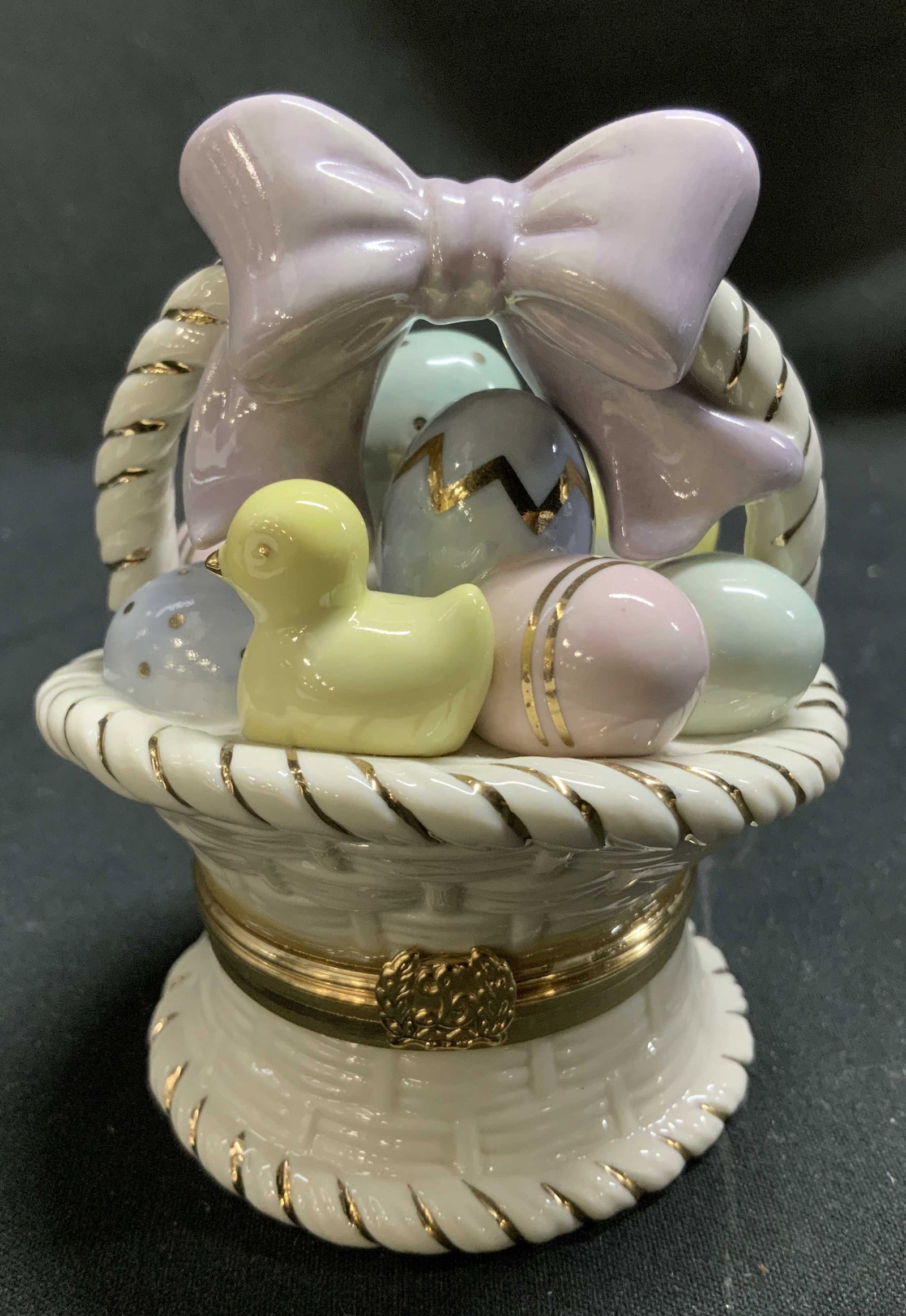 Lenox Easter Basket Surprise Trnk Box & Charm: Lenox treasures easter basket surprise trinket box Frary Des Hans painted accents & interior has a duckling charm. Signed & marked on underside. Reads, LENOX TREASURES LIMITED EDTION. FIRST ISSUE. EAS
