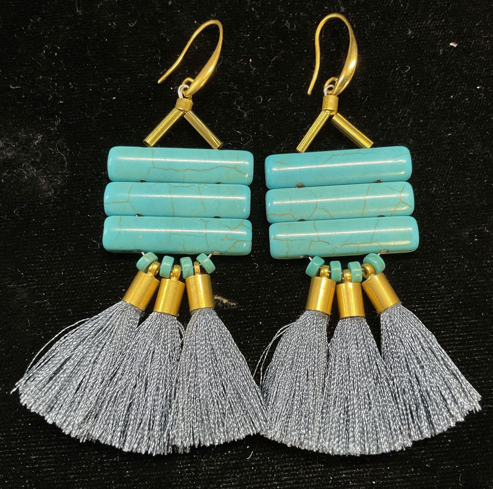David Aubrey Magnesite Silk Tassel Earrings: David Aubrey gold plated earrings with magnesite faux turquoise stone and blue silk tassels. Unsigned. Measure approx 2.75 inches long. Some scratching. Jewelry, estate jewelry, costume jewelry,