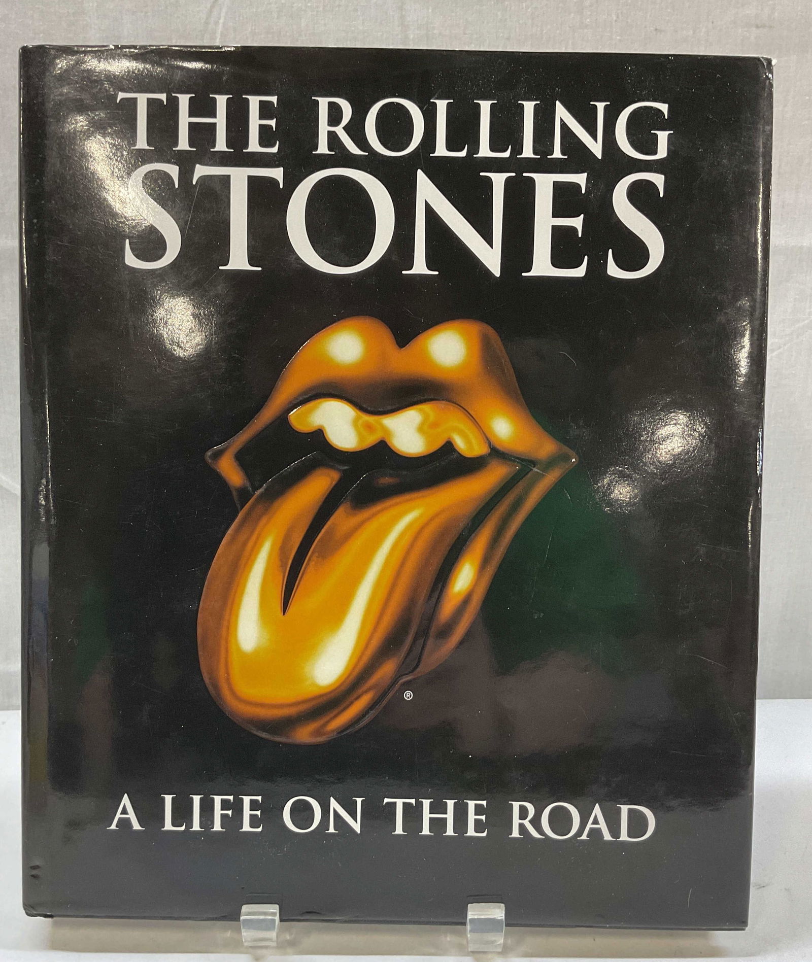Rolling Stones Life On Road Illus Bk Holland 1998+: The Rolling Stones A Life On The Road. Interviews by Jools Holland and Dora Loewenstein. Published by Penguin Studio, 1998. Includes text and illustrations. Hard cover book with illustrated book