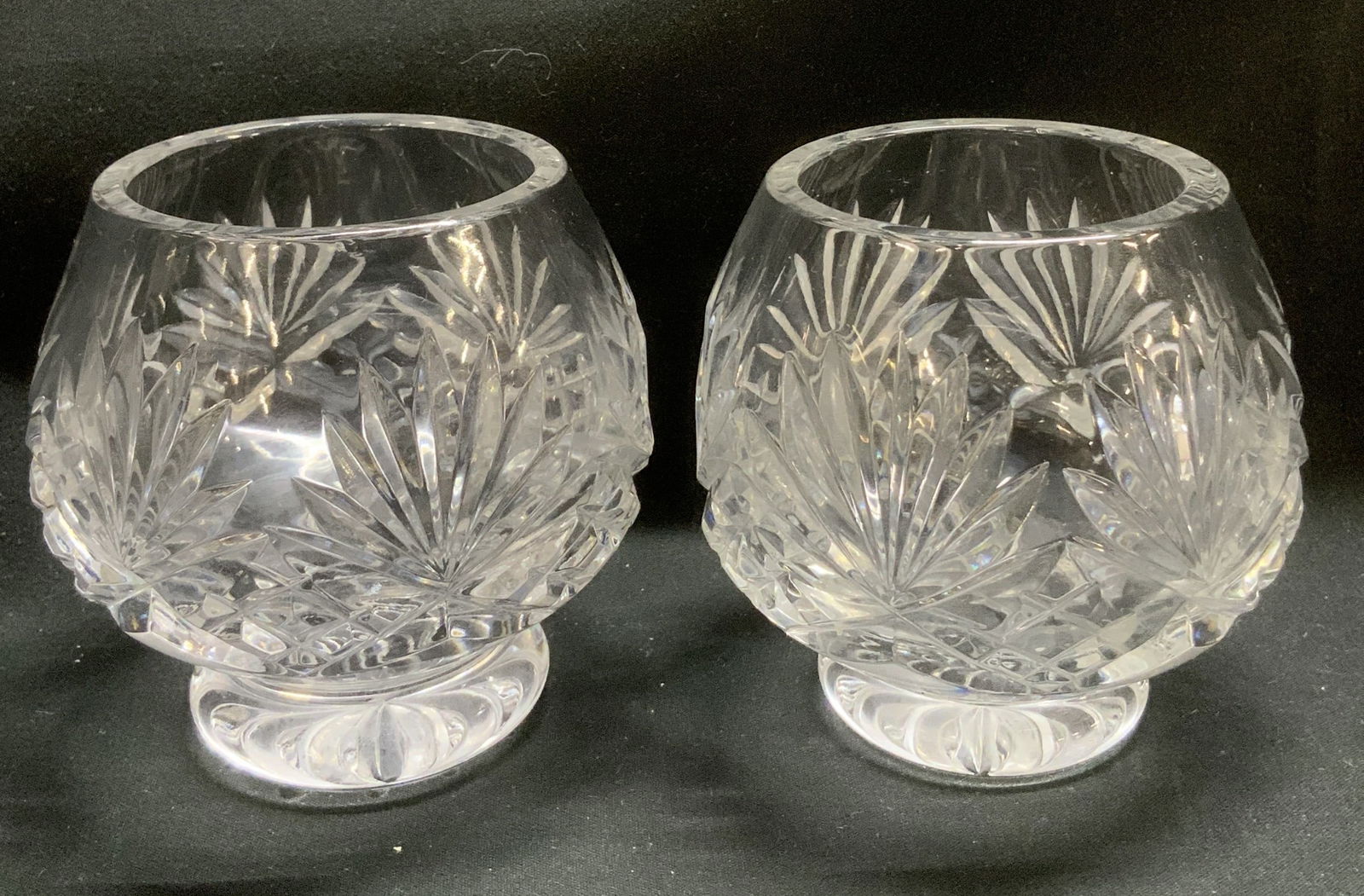 Lot 2 Vtg Clear Crystal Fan Cut Vessels: Lot includes, 2 vintage vessels with cut fan & diamond patterns on body. Footed base. Surface wear consistent to age, use & exposure. Measurements: length 3in x width 3in x height 3.5in. Vintage