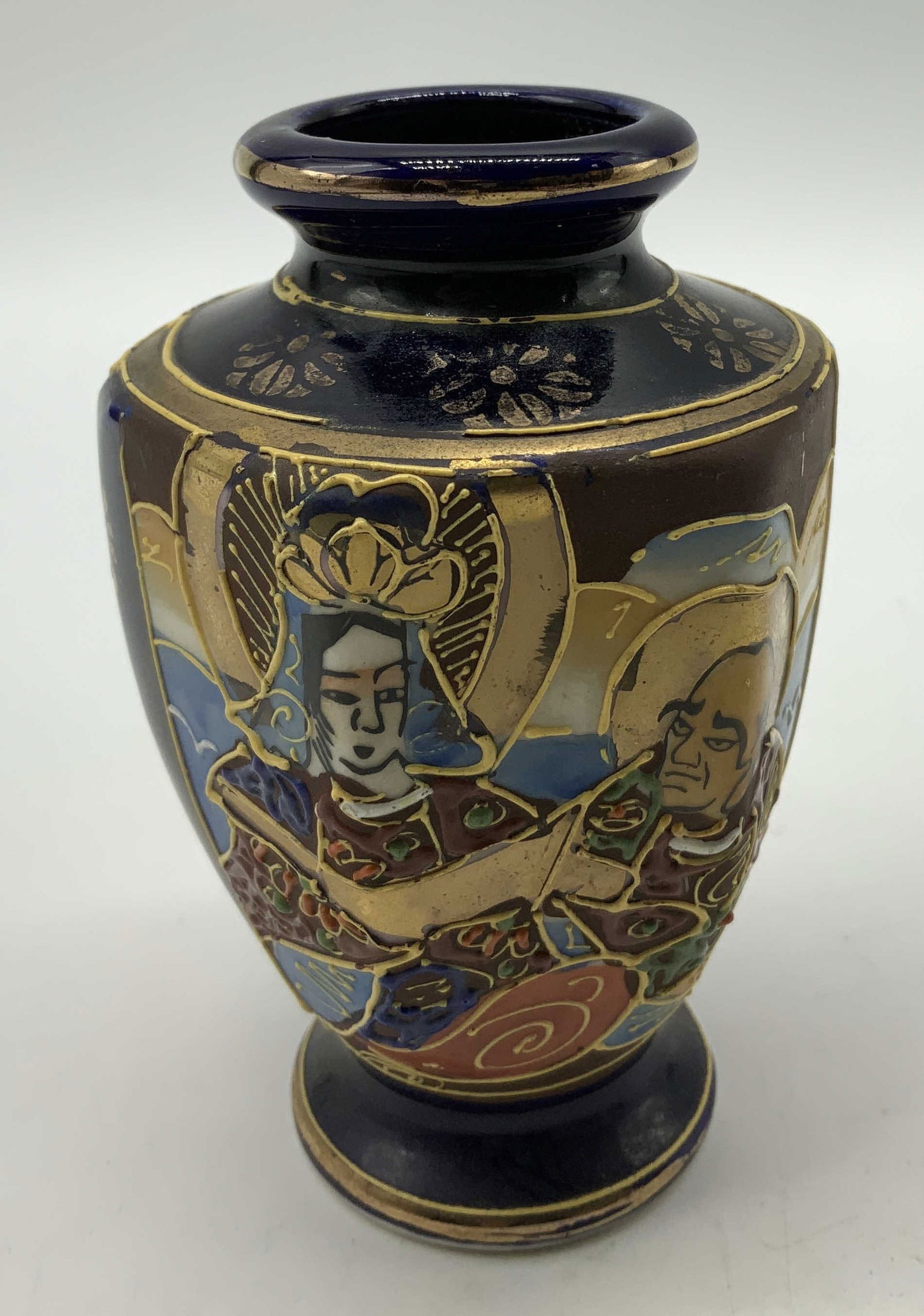 Vtg Hand Painted Satsuma Cobalt Vase JAPAN: Vintage hand-painted Satsuma vase features a cobalt blue background with gilt accents. Depicts a scene with Japanese figures. Signed & marked on underside. Reads, MADE IN JAPAN. Surface wear consisten