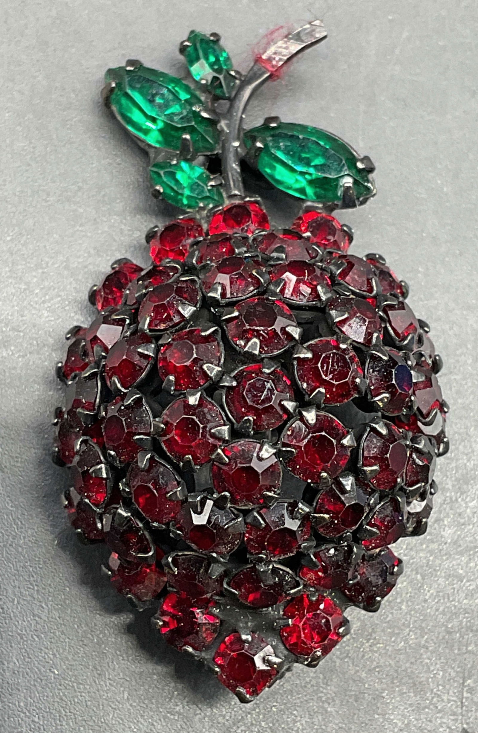 Vintage Joseph Warner Fruit Crystal Brooch: Vintage signed Joseph Warner fruit motif brooch with red and green crystals. Measures approx. 1.75 x 1 inches. Some scratching. Jewelry, estate jewelry, costume jewelry, cocktail jewelry, fashion jewe