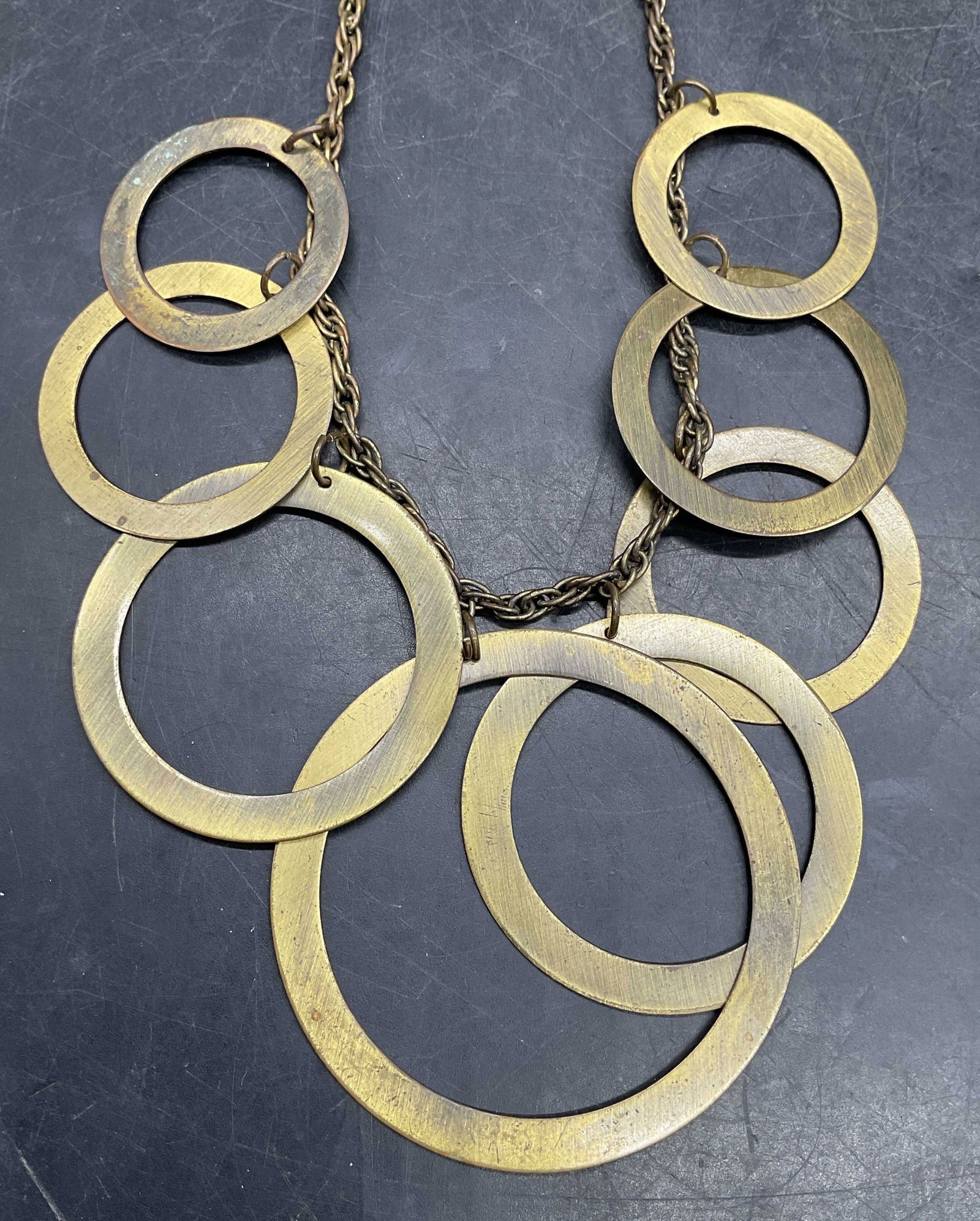 Vintage Gold Tone Open Circle Pendant Necklace: Vintage gold tone open circle pendant necklace. Drop length approx 8.5 inches. Some scratching. Jewelry, estate jewelry, costume jewelry, cocktail jewelry, fashion jewelry, accessories, fashion access