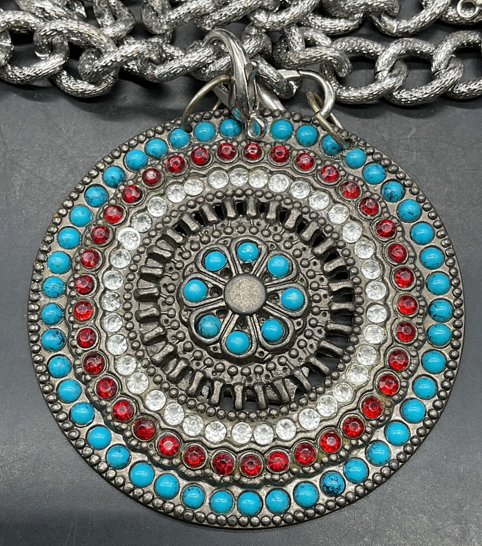 Lot 2 Silver Tn Faux Turquoise Crystal Pendant+: Lot of 2 jewelry pieces. Silver tone chunky chain necklace. Drop length approx 11 inches. Vintage silver tone faux turquoise and crystal round pendant. Measures approx. 3 inches wide. Some scratching.