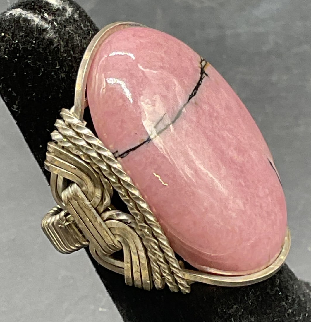 Vintage Silver Tone Pink Cabochon Ring: Vintage silver tone wire ring with pink cabochon. Ring size 6.5. Some scratching. Jewelry, estate jewelry, costume jewelry, cocktail jewelry, fashion jewelry, accessories, fashion accessories, wearabl