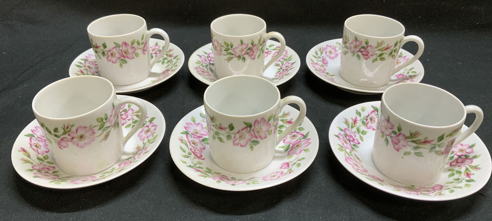 Lot 12 U.C. Limoges Floral Teacup & Saucer FRANCE: Lot includes, 6 saucer & 6 teacups. Pieces are porcelain material & feature pink floral motifs with leaves. Property of Upper East Side French stage and screen actors estate, Manhattan. Signed & marke