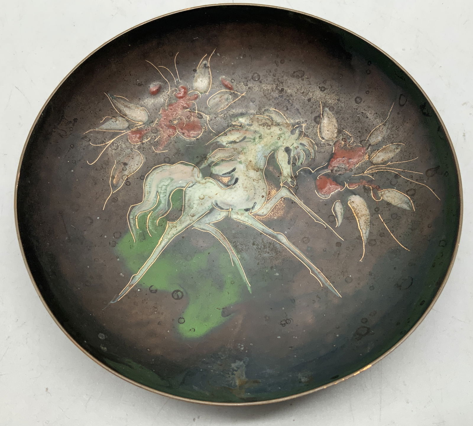 Vtg Hand Painted Horse & Floral Enamel Dish: Vintage dish features a hand painted white horse motif & floral accents. Enamel & copper toned finish. Surface wear consistent to age, use & exposure. Measurements: length 5in x width 5in x height 1in