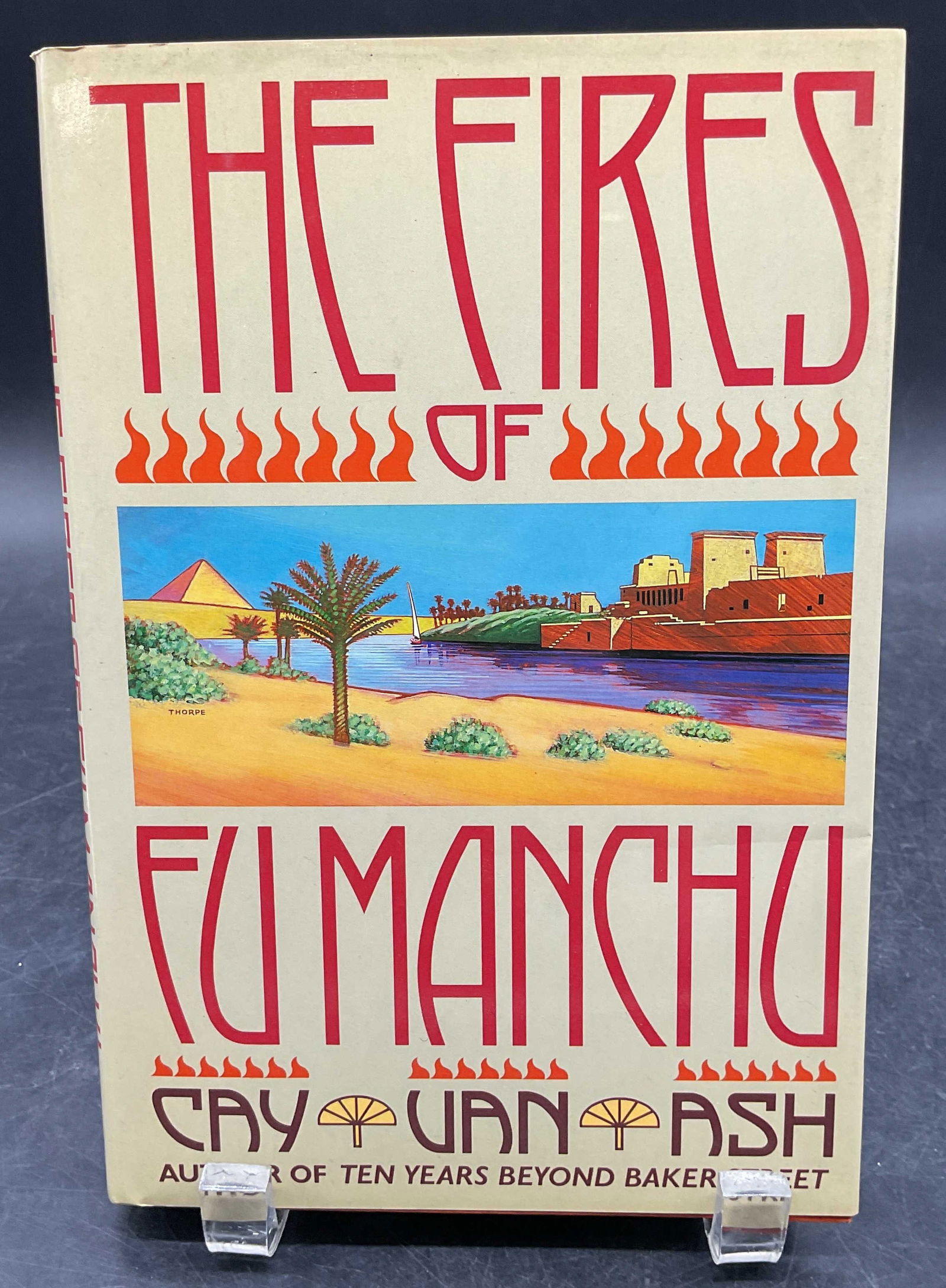 1987 Fires of Fu Manchu, Cay Van Ash, 1st Edt: Hardcover first edition copy of The Fires of fu Manchu by Cay Van Ash. Harper and Row, 1987. Measures approx. 8.5 x 5.75 inches. wear to cover, pages, and binding consistent with exposure. Book, colle