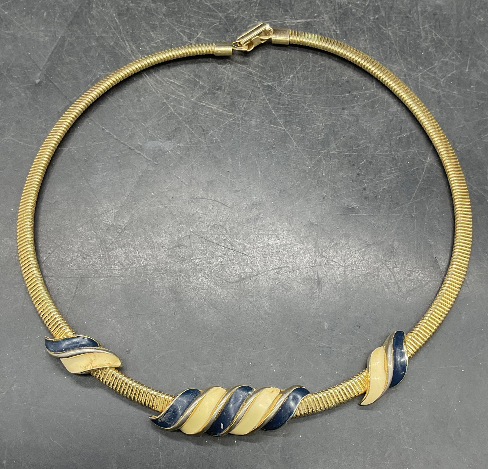Vintage Gold Tone Enamel Choker Necklace: Vintage gold tone omega chain enamel accent choker necklace. Measures approx. 5 inches wide. Some scratching. Jewelry, estate jewelry, costume jewelry, cocktail jewelry, fashion jewelry,