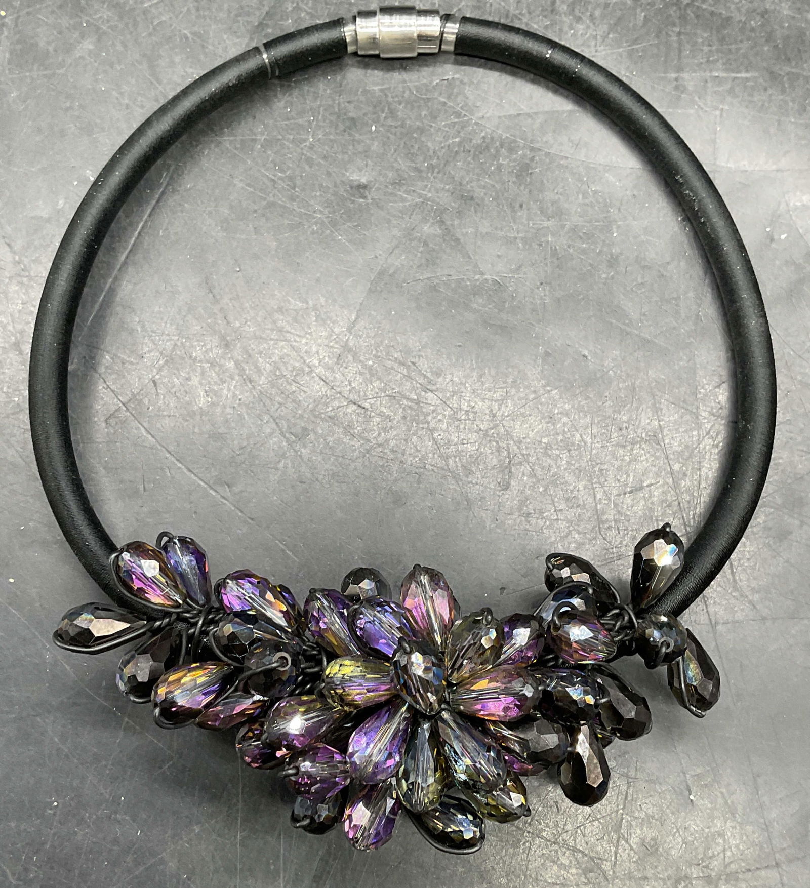 Vintage Black Purple Crystal Cluster Necklace: Vintage purple and black tones crystal cluster choker necklace with black thread wrapped cord. Measures approx. 5.75 inches wide. Some scratching. Jewelry, estate jewelry, costume jewelry,