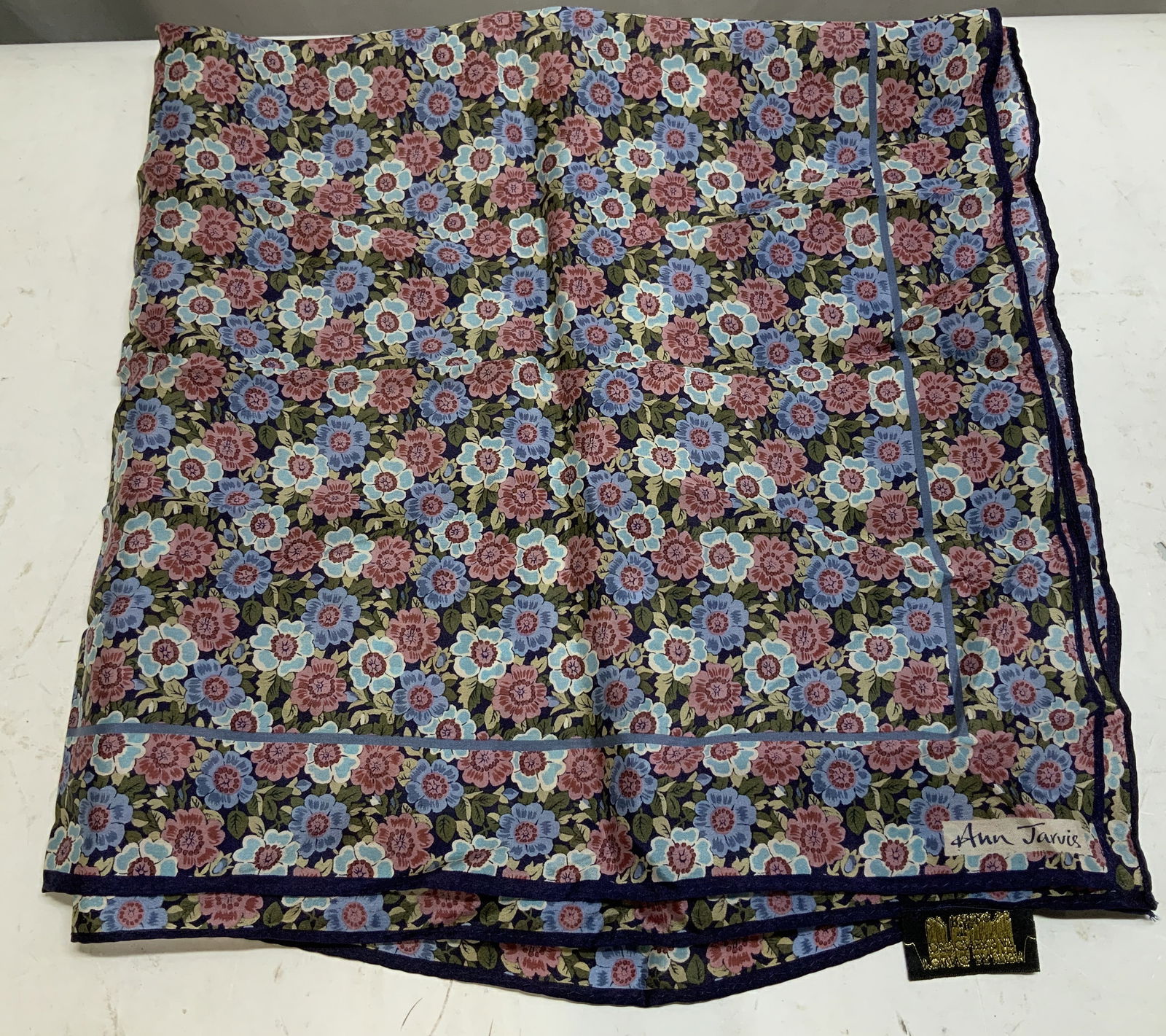 Vtg Ann Jarvis Floral Silk Scarf JAPAN: Vintage Ann Jarvis scarf is 100% silk material. Feature vibrant floral motifs. Shades of pink, green, blue & white. Signed & marked. Reads, ANN JARVIS. MADE IN JAPAN. YOUNG BRITISH DESIGNERS AT
