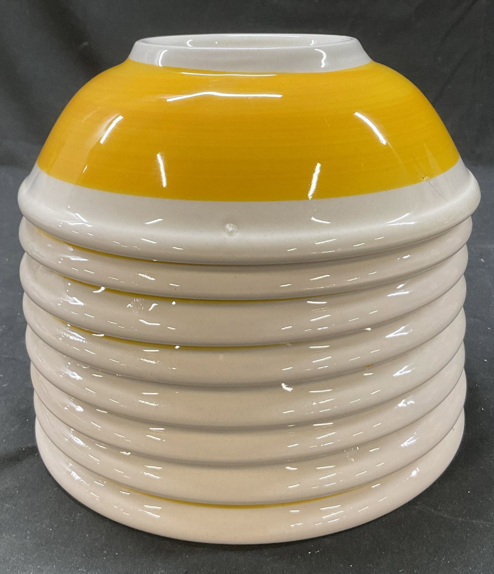 Set 8 Vintage Yellow Ceramic Bowls Italy: Set of 8 vintage yellow ceramic bowls. Marked on underside, reads illegibly, made in Italy. Round bowls with yellow hand painted bands. Measures ht approx 2.5 inches diam approx 8 inches. Surface