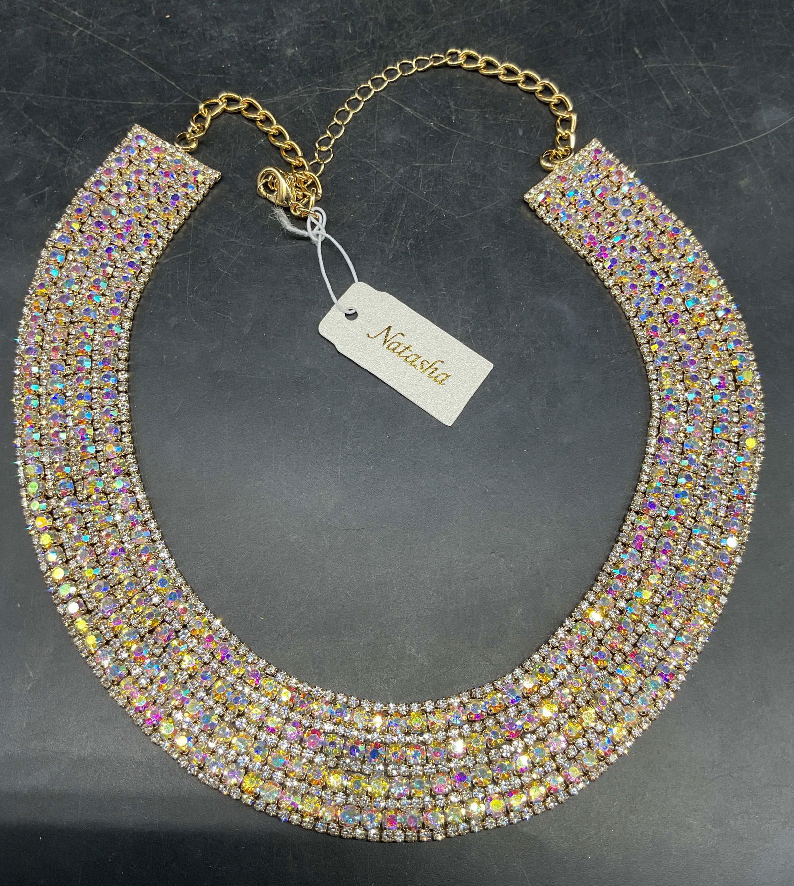 Natasha Gold Tone Crystal Bib Necklace NWT: Natasha gold tone crystal bib necklace. New with tag. Drop length approx 9 inches. Some scratching. Jewelry, estate jewelry, costume jewelry, cocktail jewelry, fashion jewelry, accessories, fashion ac