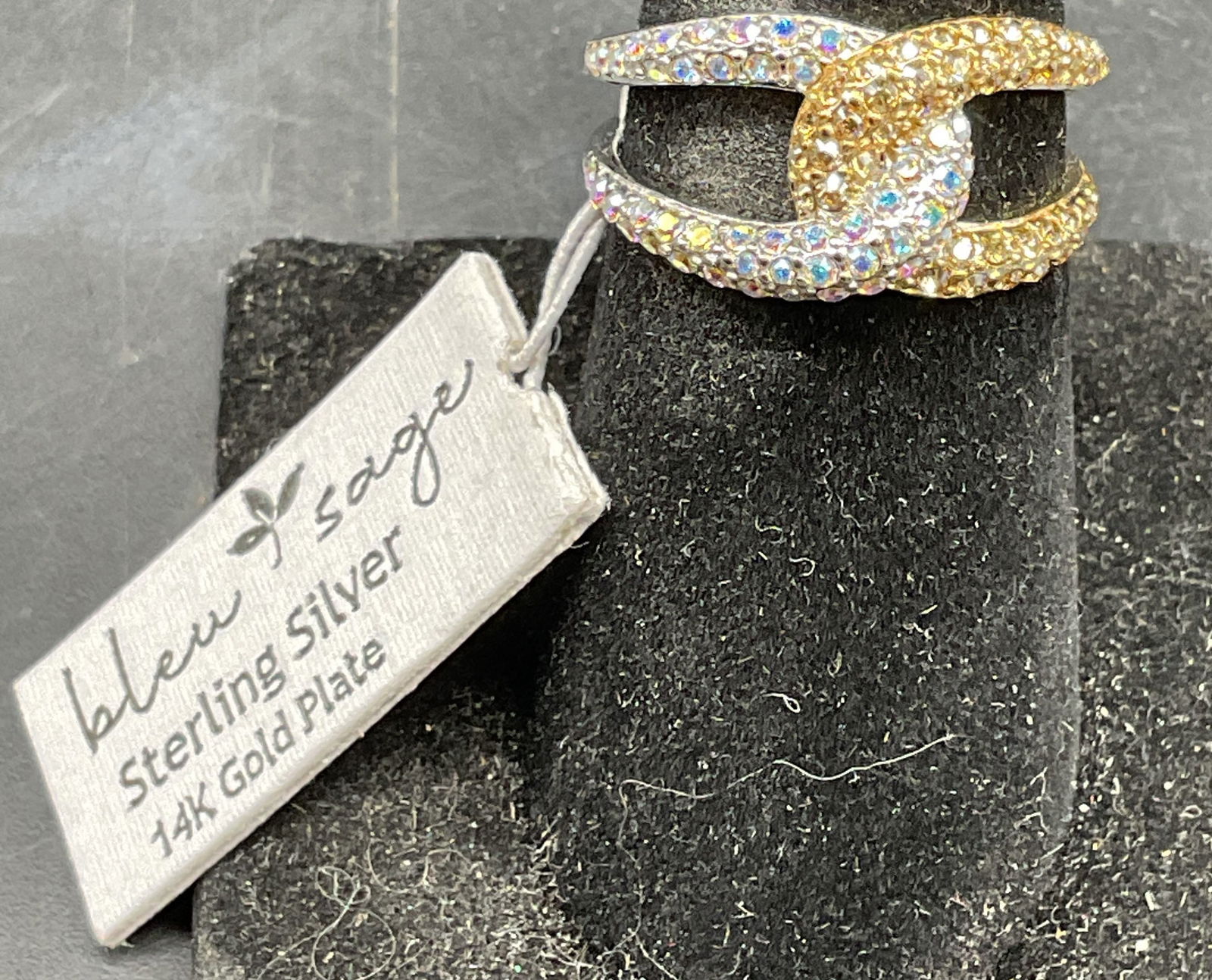 Bleu Sage Sterling Silver Crystal Ring NWT: Bleu Sage Sterling silver 14k gold plated interlocking ring with crystals. New with tag. Size 7. Marked sterling. Total weight 3.4 grams. Some scratching. Jewelry, estate jewelry, fine jewelry, cockta