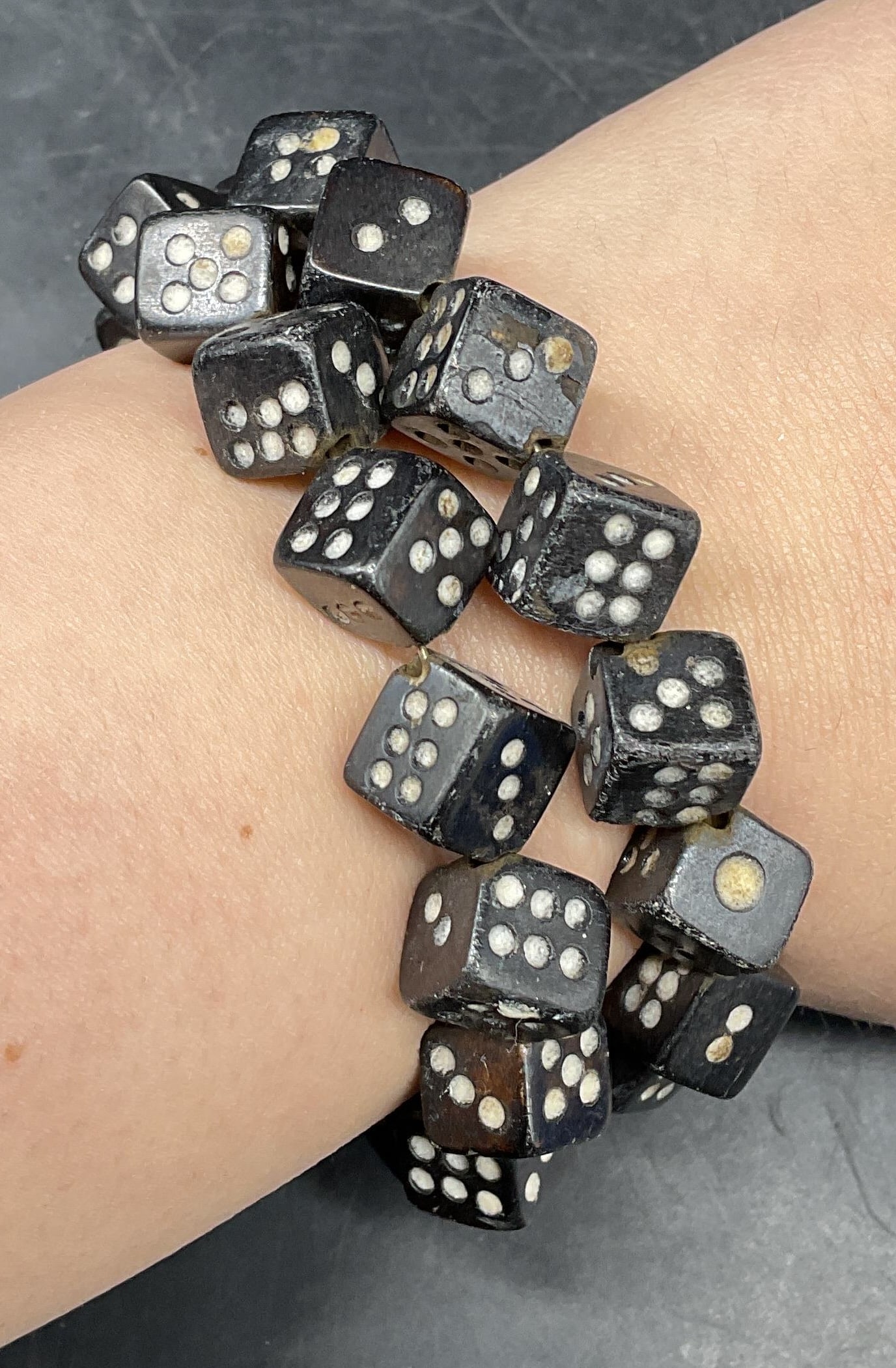 Vintage Black Dice Beaded Wrap Bracelet: Vintage black and white dice beaded wrap bracelet. Measures approx. 2 inches wide. Some scratching. Jewelry, estate jewelry, costume jewelry, cocktail jewelry, fashion jewelry, accessories, fashion ac