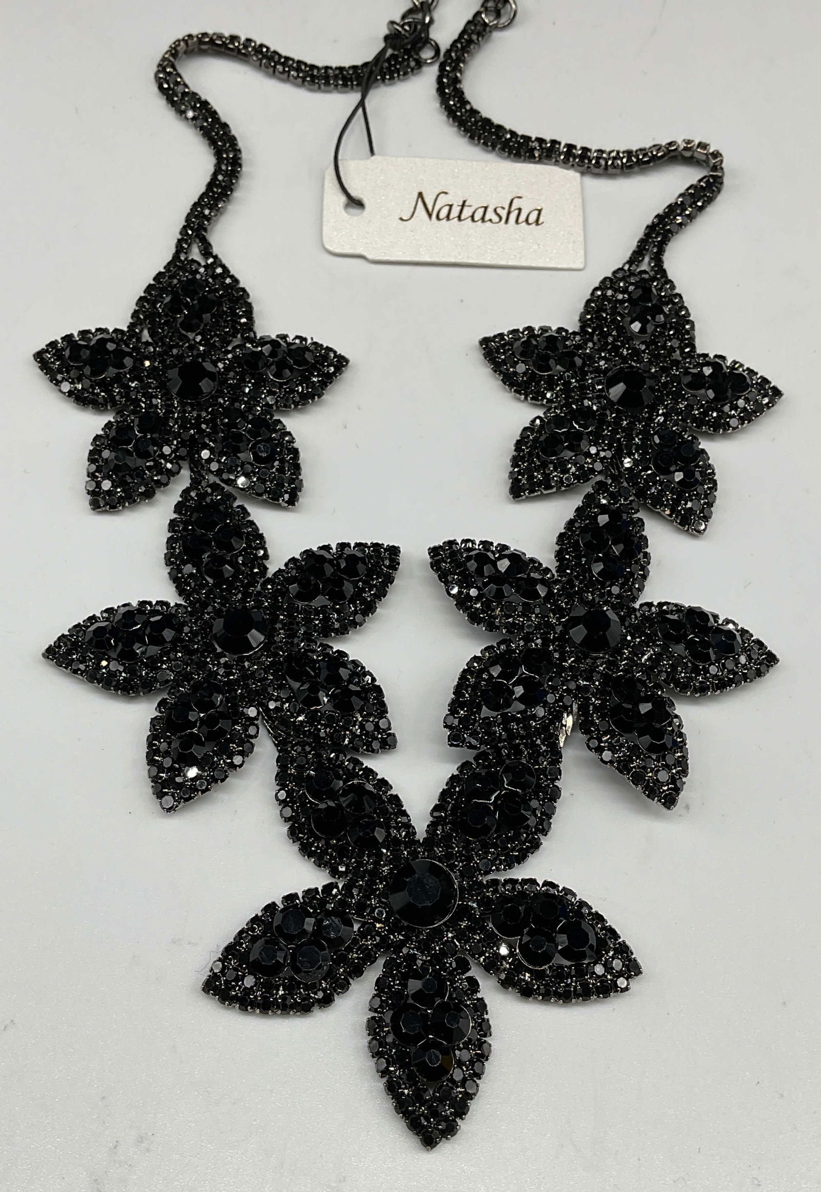 Natasha Black Crystal Flower Necklace NWT: Natasha black crystal flower pendant necklace. New with tag. Drop length approx 10.5 inches. Some scratching. Jewelry, estate jewelry, costume jewelry, cocktail jewelry, fashion jewelry, accessories,