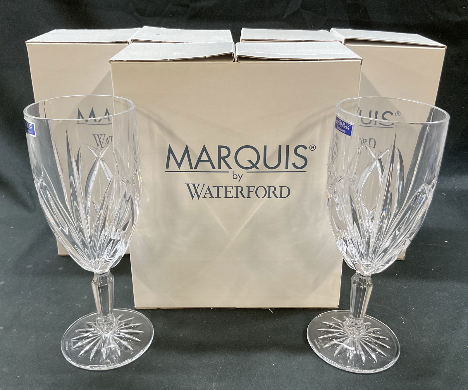 6 SGND Marquis By Waterford Stemware Germany NIB: New in boxes. Set of 6 Marquis by Waterford Brookside crystal iced tea goblets. Made in Germany. Signed Marquis by Waterford. 3 boxes come with two each. Brookside pattern. Intricate cuts and facets.