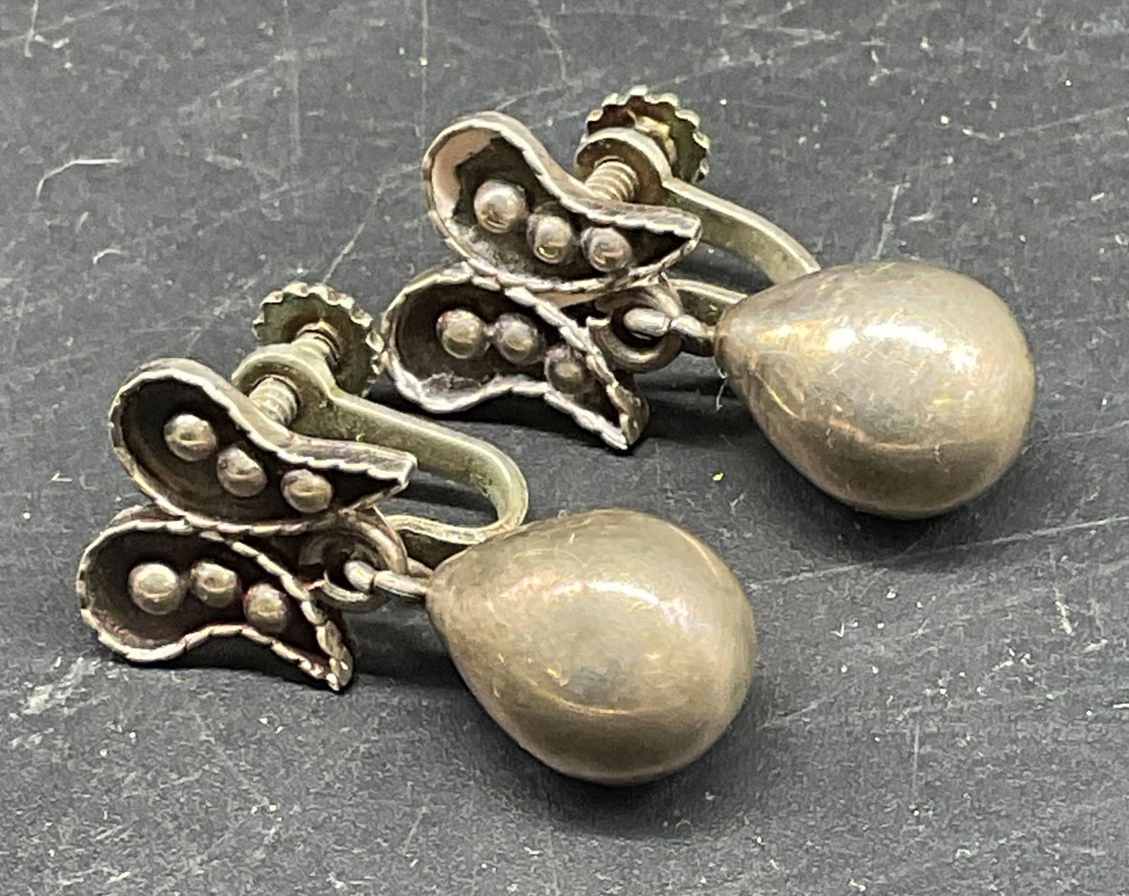 Vintage Sterling Silver Dangle Earrings: Vintage sterling silver dangle earrings. Marked sterling. Measures approx. 1 inch long. Total weight 4.6 grams. Some scratching. Jewelry, estate jewelry, fine jewelry, cocktail jewelry, fashion