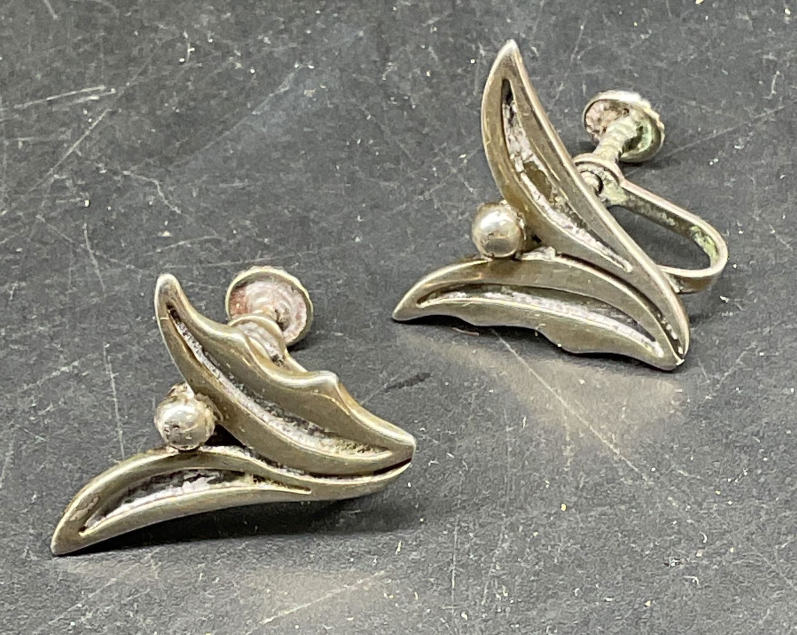 Signed Sterling Silver Modernist Earrings: Signed Sterling silver modernist earrings. Signed illegibly. Marked sterling. Measures approx. .75 inches long. Total weight 5.9 grams. Some scratching. Jewelry, estate jewelry, fine jewelry, 