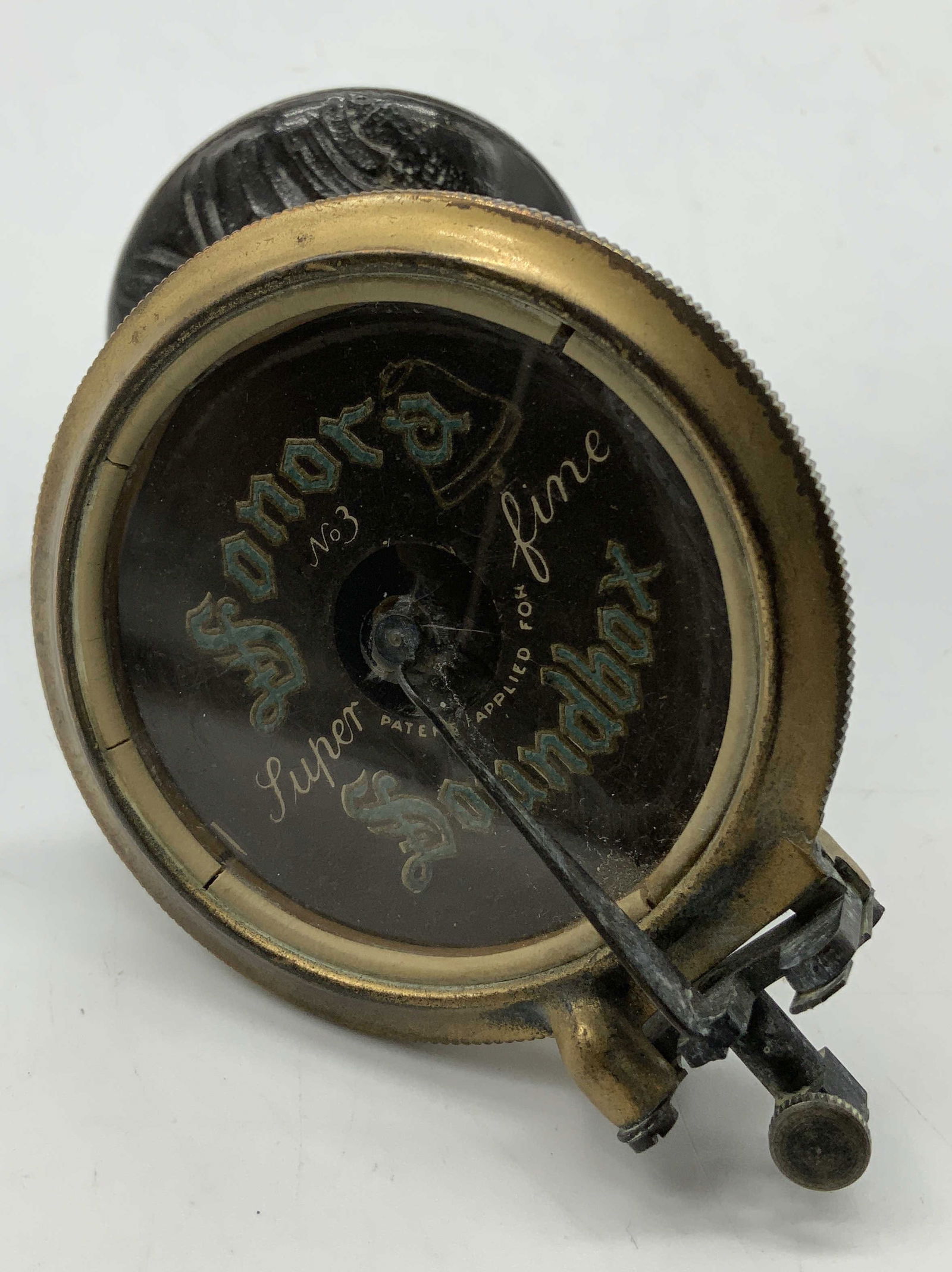 Antique Sonora Soundbox Photograph Needle: Antique photograph needle is wooden & brass material. Reads, Sonora Super Fine Soundbox. No.3. Carved detailing on wood. Property of opera singers estate from the renowned & opulent Manhattan