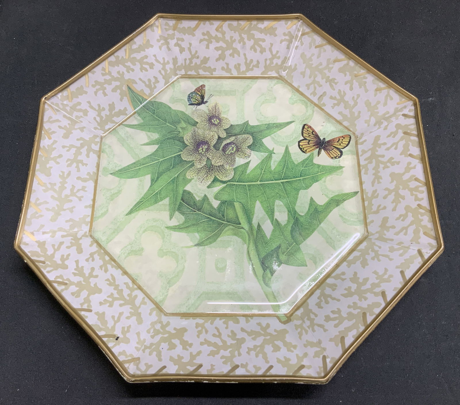 Moonlighting Interiors Decoupage Glass Plate: Moonlighting interiors decorative decoupage glass plate features leaf & butterfly motifs in center. Gilt accents. Octagonal shape. Signed & marked on underside. Reads, MOONLIGHTING INTERIORS. Surface