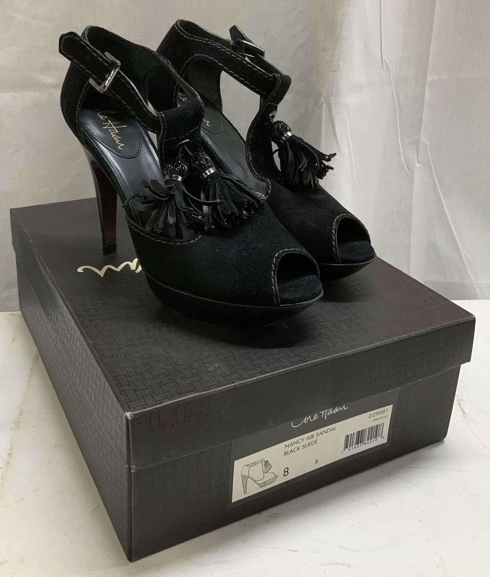 Cole Haan Nancy Air Black Heels W Org Box: Lot includes, a pair of Cole Haan Nancy Air heels featuring tassel accents. Black suede. Comes with original box. Size 8. Signed & marked. Reads, COLE HAAN. Surface wear consistent to age, use &