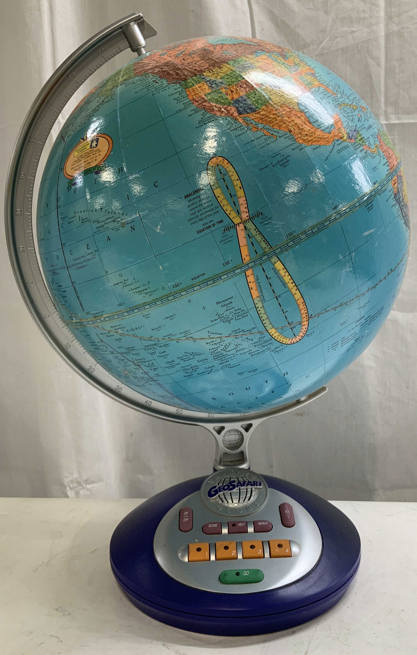 Educational Insights Geosafari Talking Globe: Educational Insights GeoSafari Talking Globe feature a blue base with various control buttons. Plastic material. Signed & marked on underside. Reads, GEOSAFARI TALKING GLOVE. FOR EDUCATIONAL