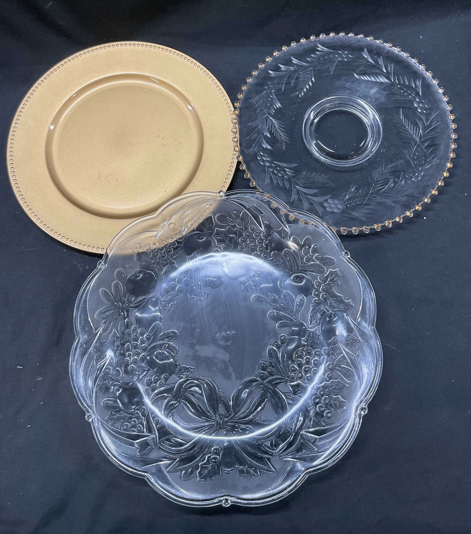 Lot 3 Vintage Bali+ Decorative Serving Platters: Lot of 3 vintage decorative serving platters. Glass and plastic material. One reads Bali on underside. Scalloped, beaded, and candlewick gilt edge. Etched floral and leaf motifs. Embossed fruit and ri