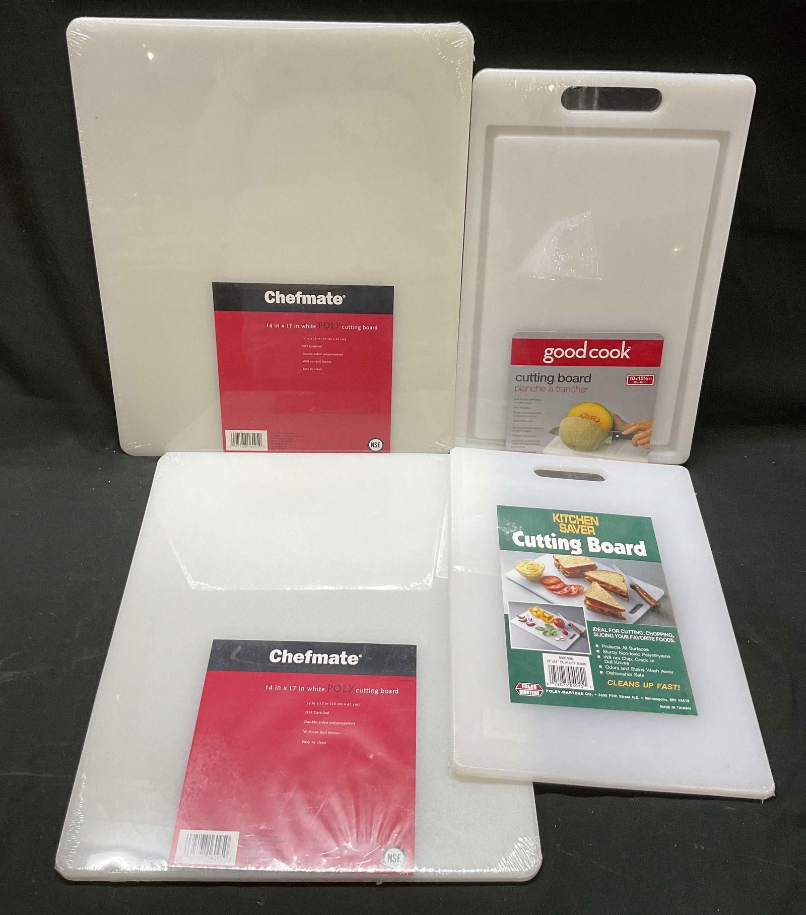 Lot 4 Kitchen Saver+ Cutting Boards NIP: Lot of 4 items. Kitchen Saver cutting board, polyethylene, measures 10 x 14 inches. Good Cook cutting board, plastic, measures 10 x 15.5 inches. Two Chefmate cutting boards, polypropylene,