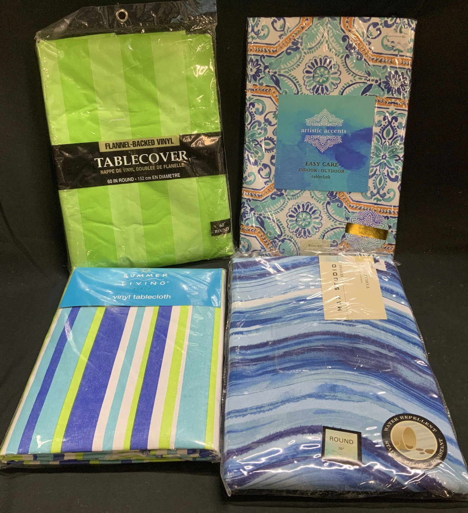 Lt4 Assorted Table Covers AMSCAN, MAX STUDIO+ NIP: NIP Lot includes, AMSCAN Flannel Backed Vinyl table cover size 60in round, 1 Summer Living vinyl tablecloth 70in, 1 Max Studio Home tablecloth round 70in & 1 Artistic Accents tablecloth round 70in. Ne