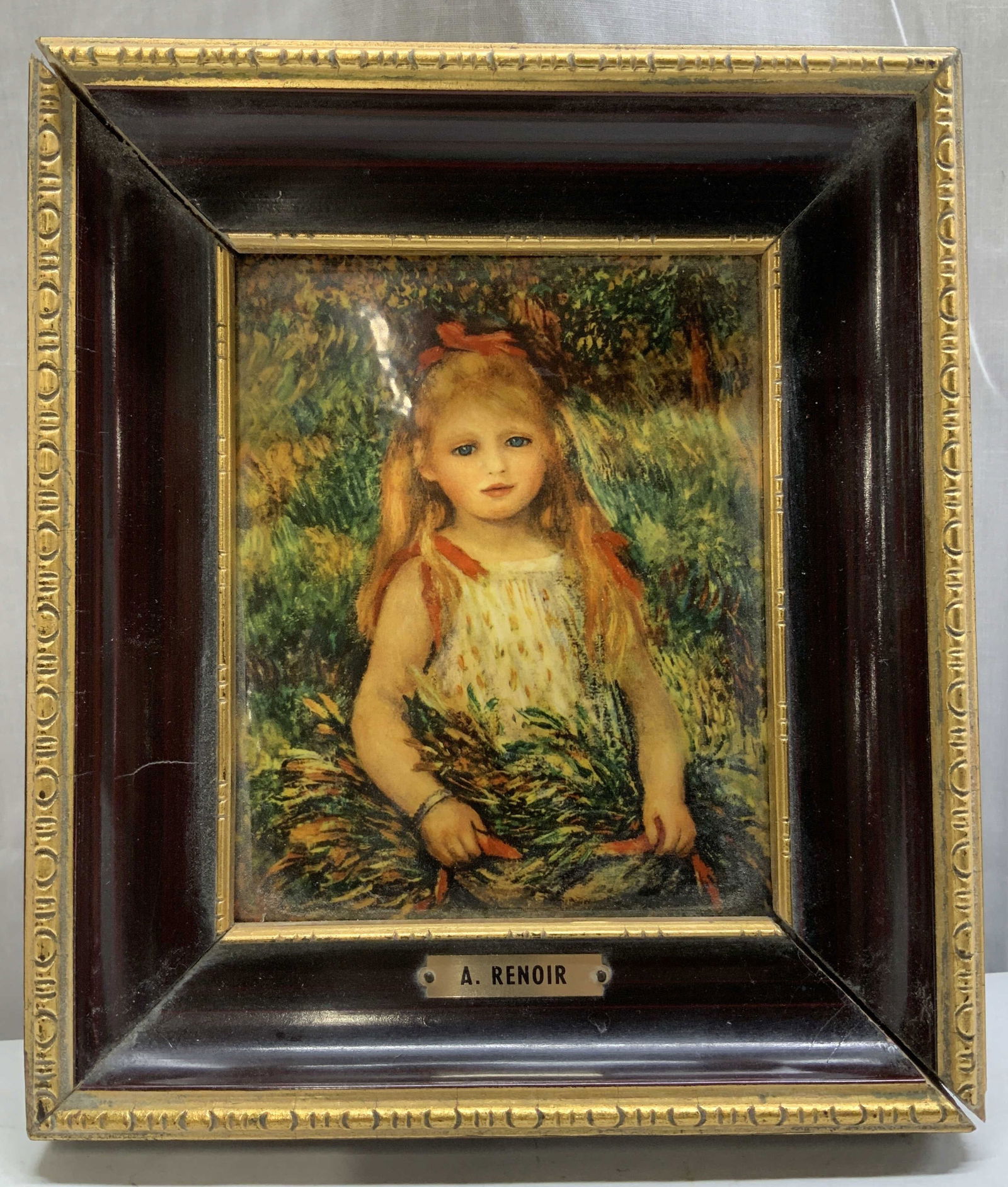 Vtg A. Renoir Fine Art Reproduction Print: Vintage fine art reproduction print of famous artwork. Nameplate reads, A. Renoir. Print depicts a young blonde girl. Gilt frame. Surface wear consistent to age, use & exposure. Property of Upper
