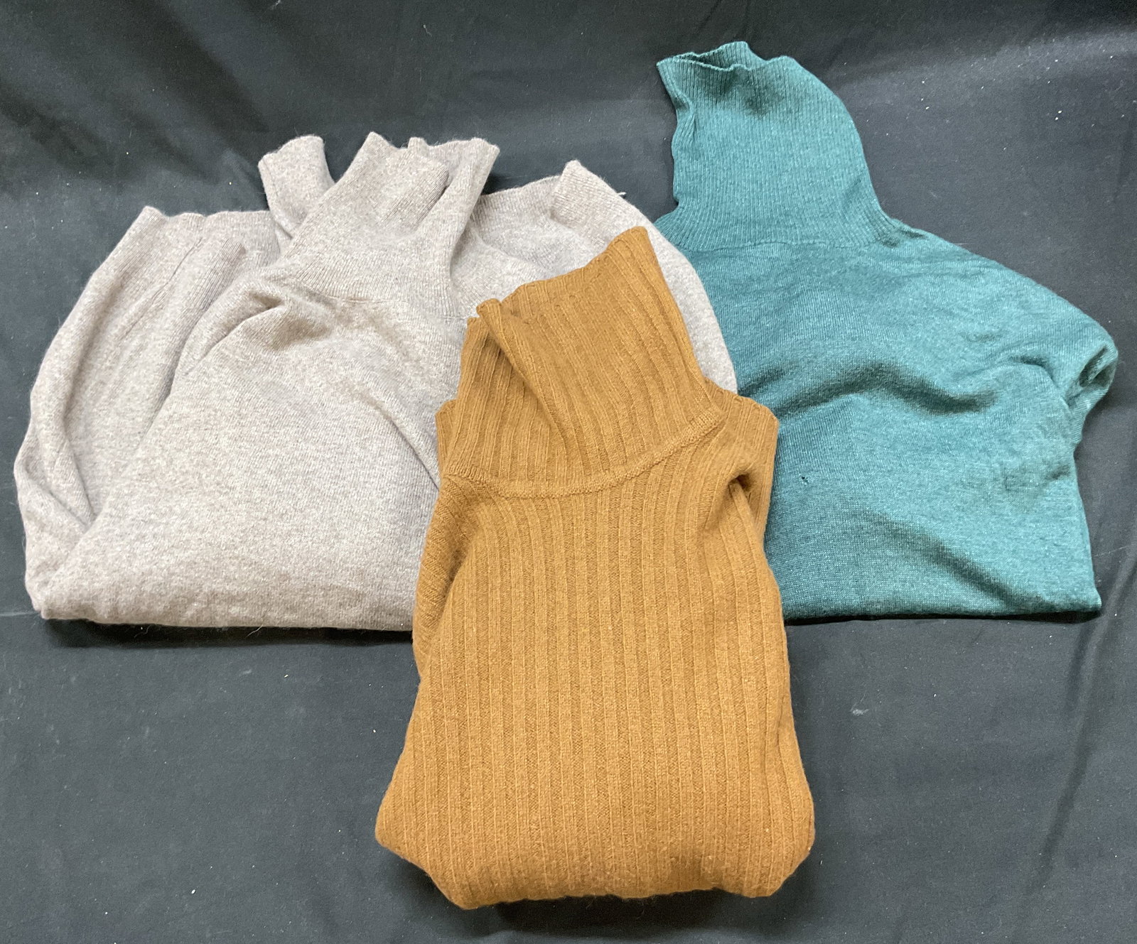 Lot 3 Jaeger+ Turtleneck Sweaters Italy+: Lot of 3 turtleneck sweaters. Jaeger brown turtleneck sweater, size M, camel hair lambswool and cashmere material, made in Great Britain. Palio grey turtleneck sweater, size M, wool material,