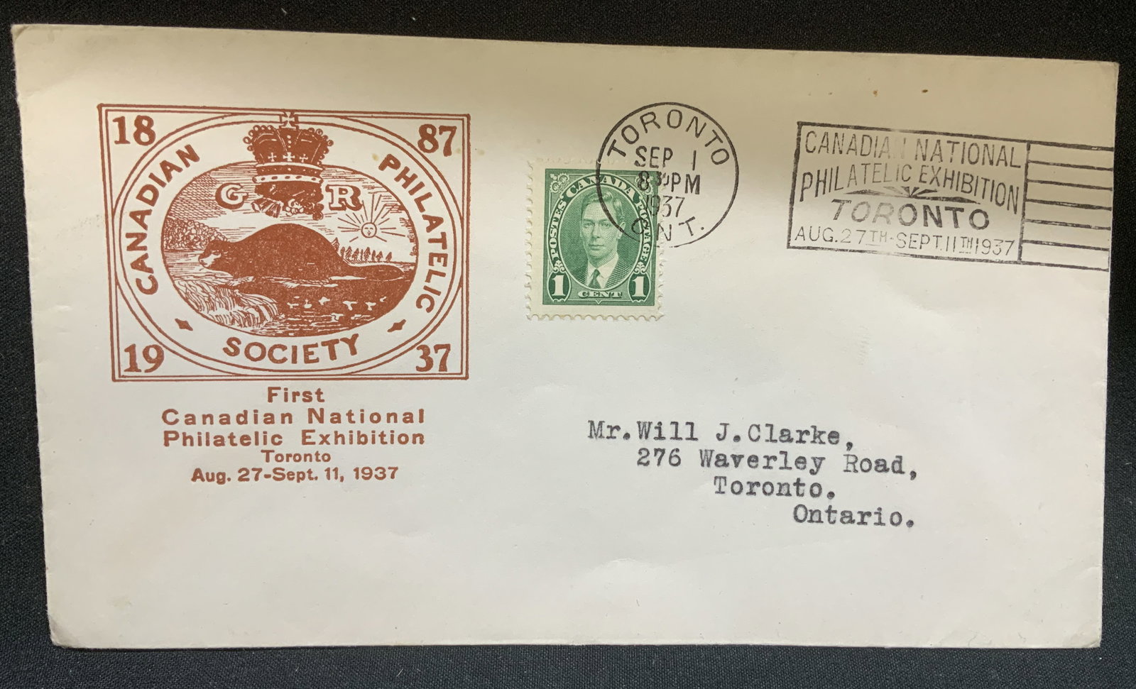 1937 First Canadian National Phil Exhibit Comm Cvr: First Canadian National Philatelic Exhibition held in Toronto. Commemorates the philatelic exhibition running from Aug. 27 to Sept. 11, 1937. Features a postage mark & Canadian postage stamp.
