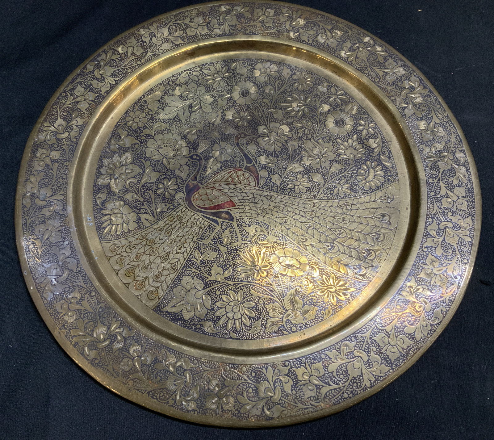 Vtg Brass Peacock & Floral Motif Deco Plate INDIA: Vintage brass decorative plate features intricate peacock & floral motifs. Peacock has red & yellow accents. Signed & marked on underside. Reads, MADE IN INDIA. Surface wear consistent to age, use & e