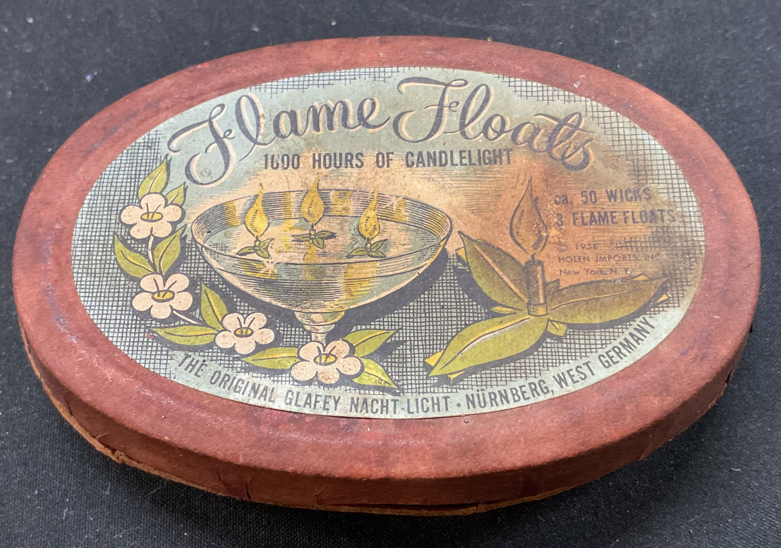 1958 Nacht Licht Flame Floats W Box Germany: Nacht Licht flame floats. Box reads Flame Floats 1000 Hours Of Candlelight Ca. 50 Wicks 3 Flame Floats 1958 Holen Imports Inc New York, NY The Original Glafey Nacht Licht Nurnberg West Germany. Decora
