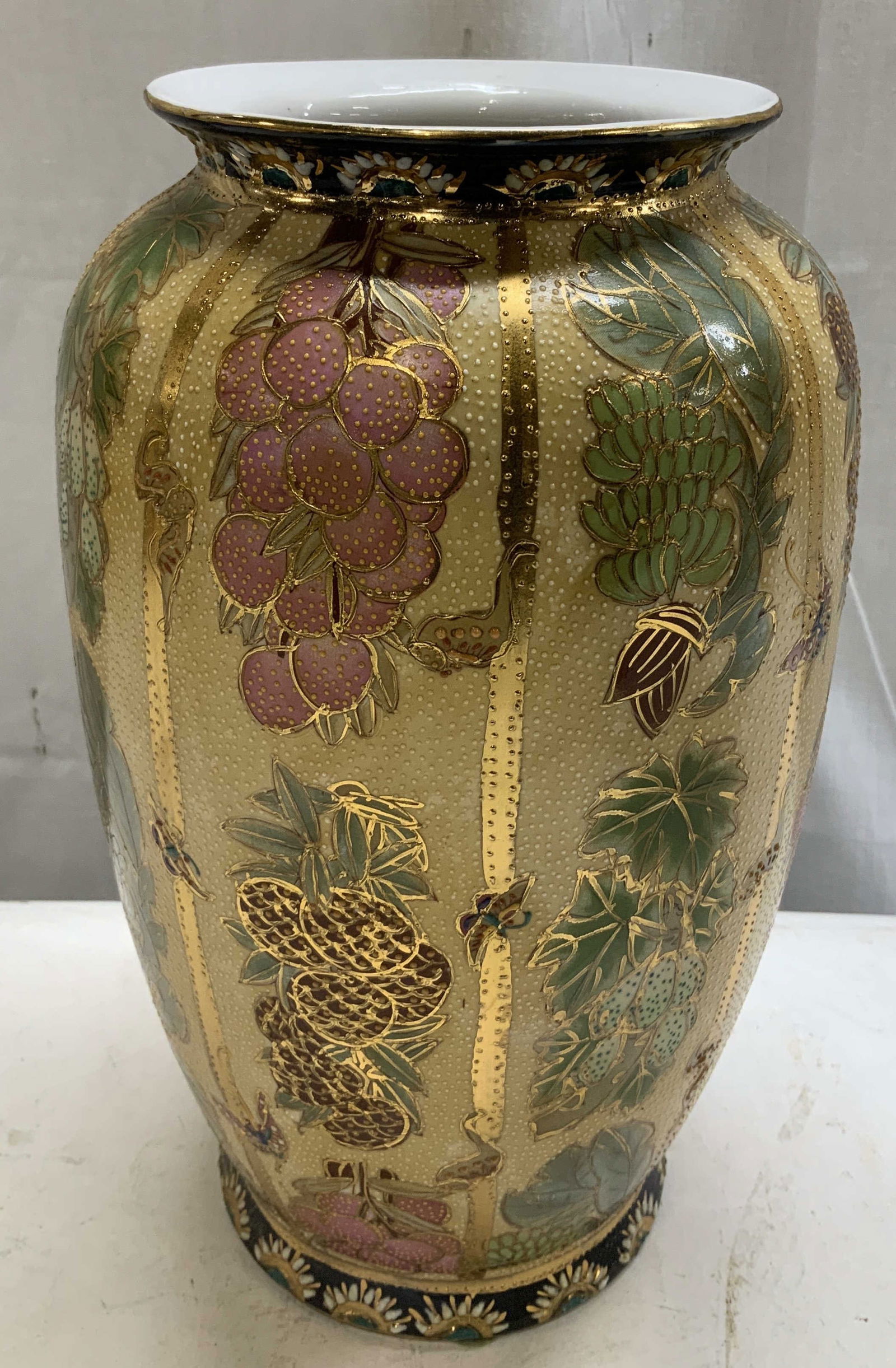 Vtg Hand Painted Fruit & Floral Gilt Porc Vase: Vintage porcelain vase features hand painted floral & fruit motifs. Extensive gilt accents. Textured body. Surface wear consistent to age, use & exposure. Measurements: length 6.5in x width 6.5in x he