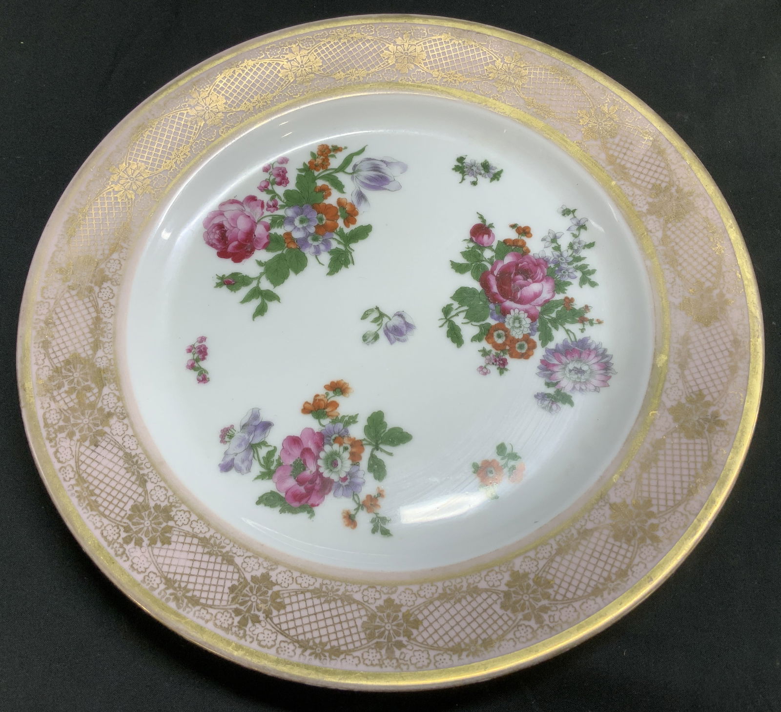 Vtg Bavaria Tirschenreuth Floral Porc Plate: Vintage Bavaria Tirschenreuth porcelain plated features vibrant floral motifs. Pink border with gilt accents. Signed & marked on underside. Reads, BAVARIA Tirschenreuth. Surface wear consistent to age