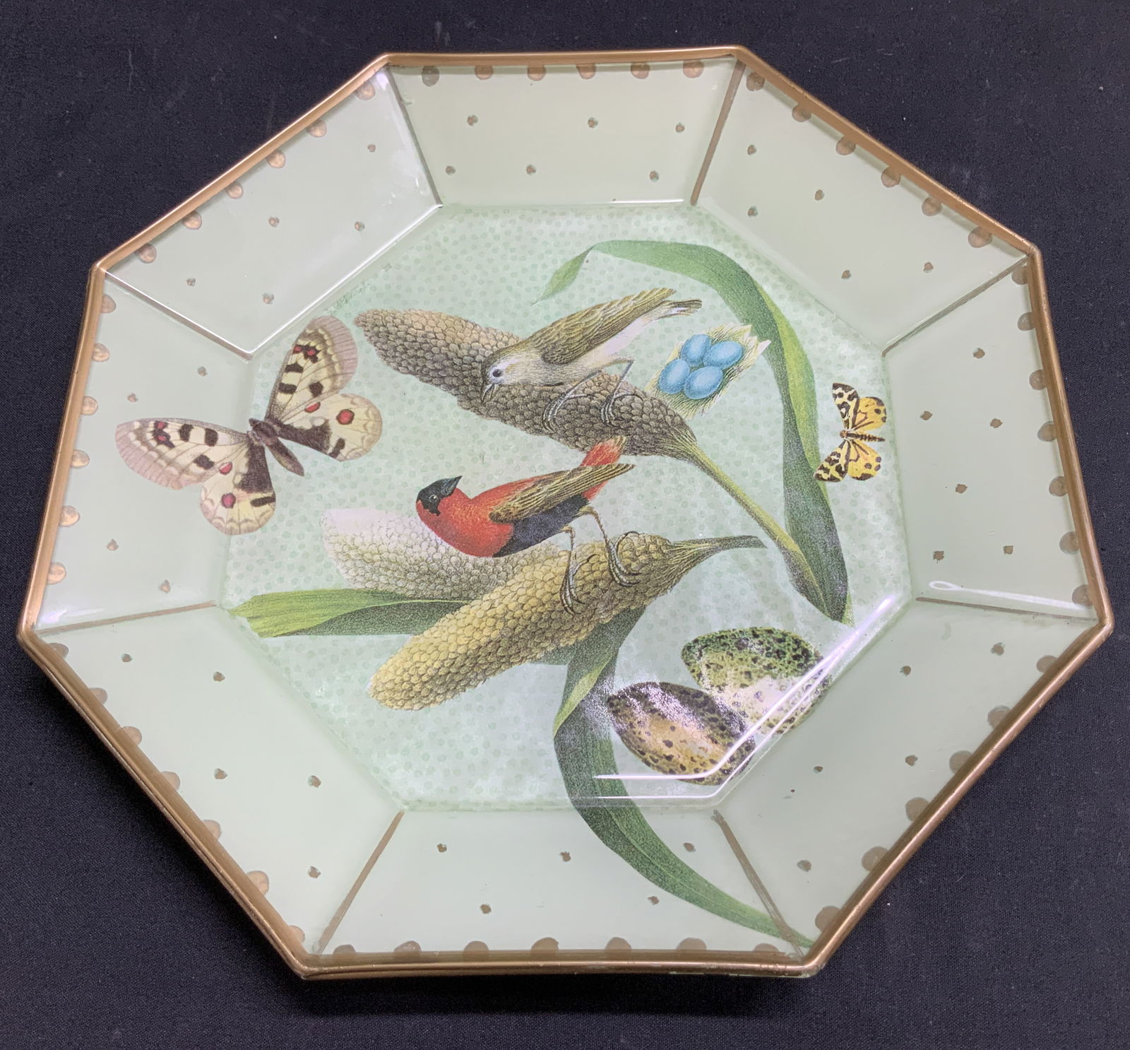 Moonlighting Interiors Decoupage Glass Plate: Moonlighting interiors decorative decoupage glass plate features bird, butterfly & leaf motifs in center. Gilt accents. Octagonal shape. Signed & marked on underside. Reads, MOONLIGHTING INTERIORS. Su