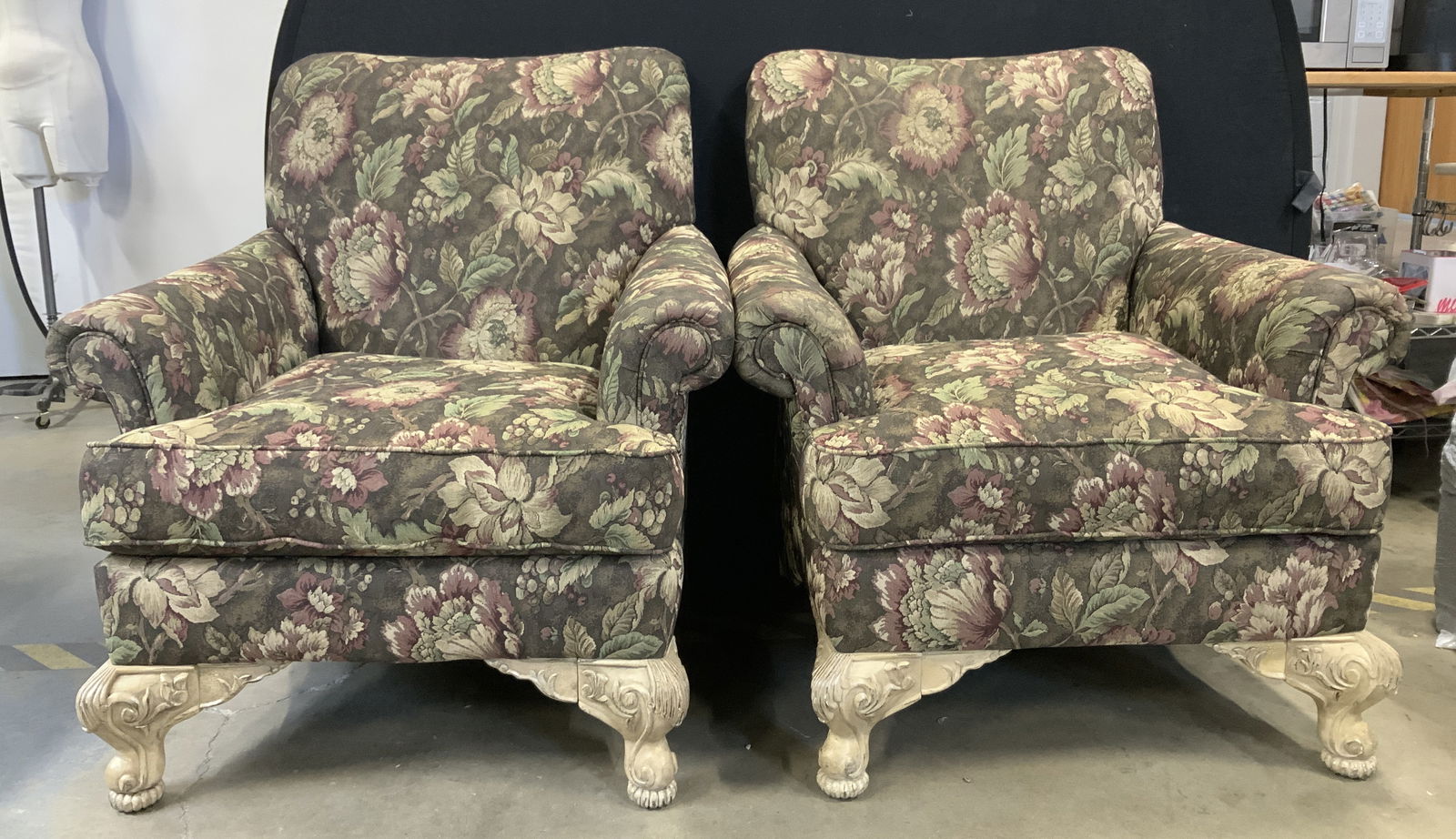 Pair SCHNADIG USA Floral Upholstered Armchairs: A pair of SCHNADIG floral & grapevine patterned upholstery armchairs. Carved front feet. Tag beneath cushions reads SCHNADIG. Made in North Carolina USA. Measures approx. 39H x 36W x 30D in. Some wear