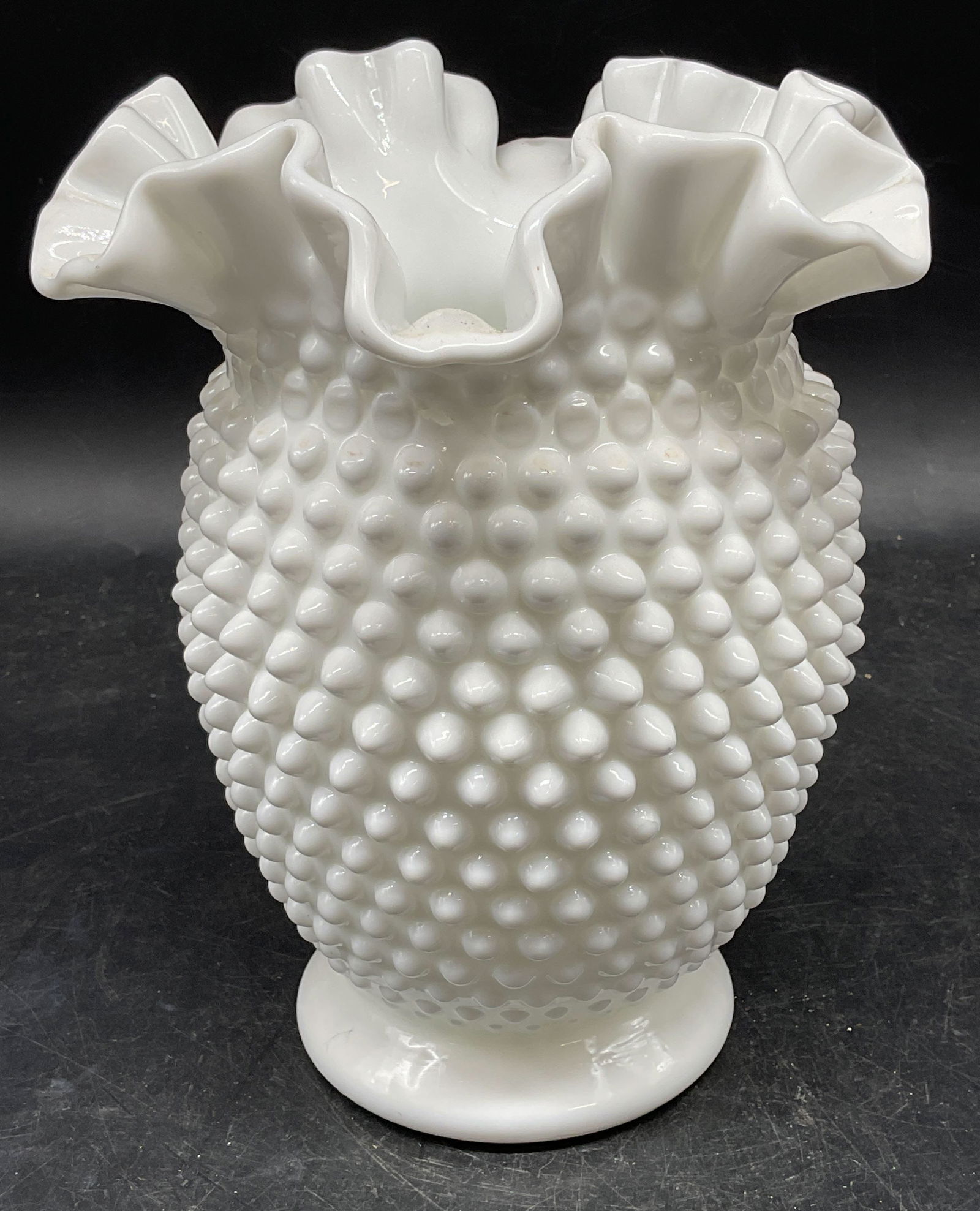 Vintage Milk Glass Hobnail Ruffle Vase: Vintage milk glass vase. Hobnail pattern with handkerchief ruffle rim. Measures approx. 6 x 7.75 inches. Some scratching. Milk glass vase, hobnail vase, ruffle vase, home decor, home accessories, tabl