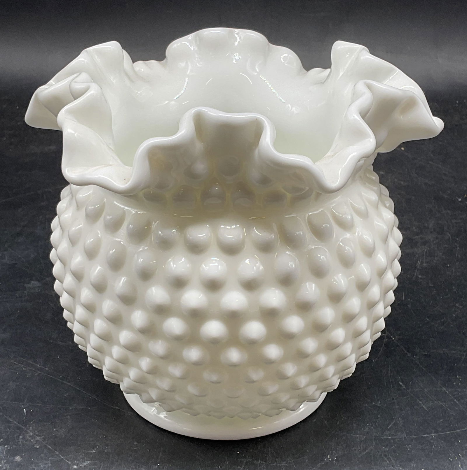 Vintage Milk Glass Hobnail Ruffle Vase: Vintage milk glass vase. Hobnail pattern with handkerchief ruffle rim. Measures approx. 6 x 5.25 inches. Some scratching. Milk glass vase, hobnail vase, ruffle vase, home decor, home accessories, tabl